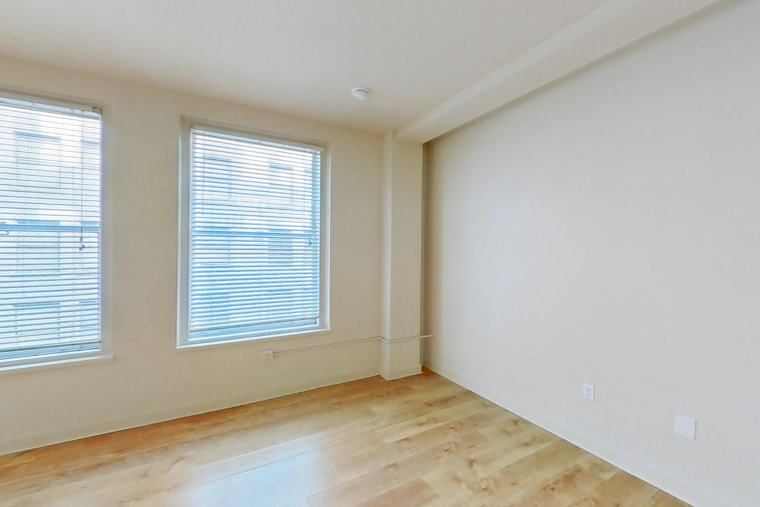 Living room in Apartment 00-0730 at Metro 417, 2B floor plan