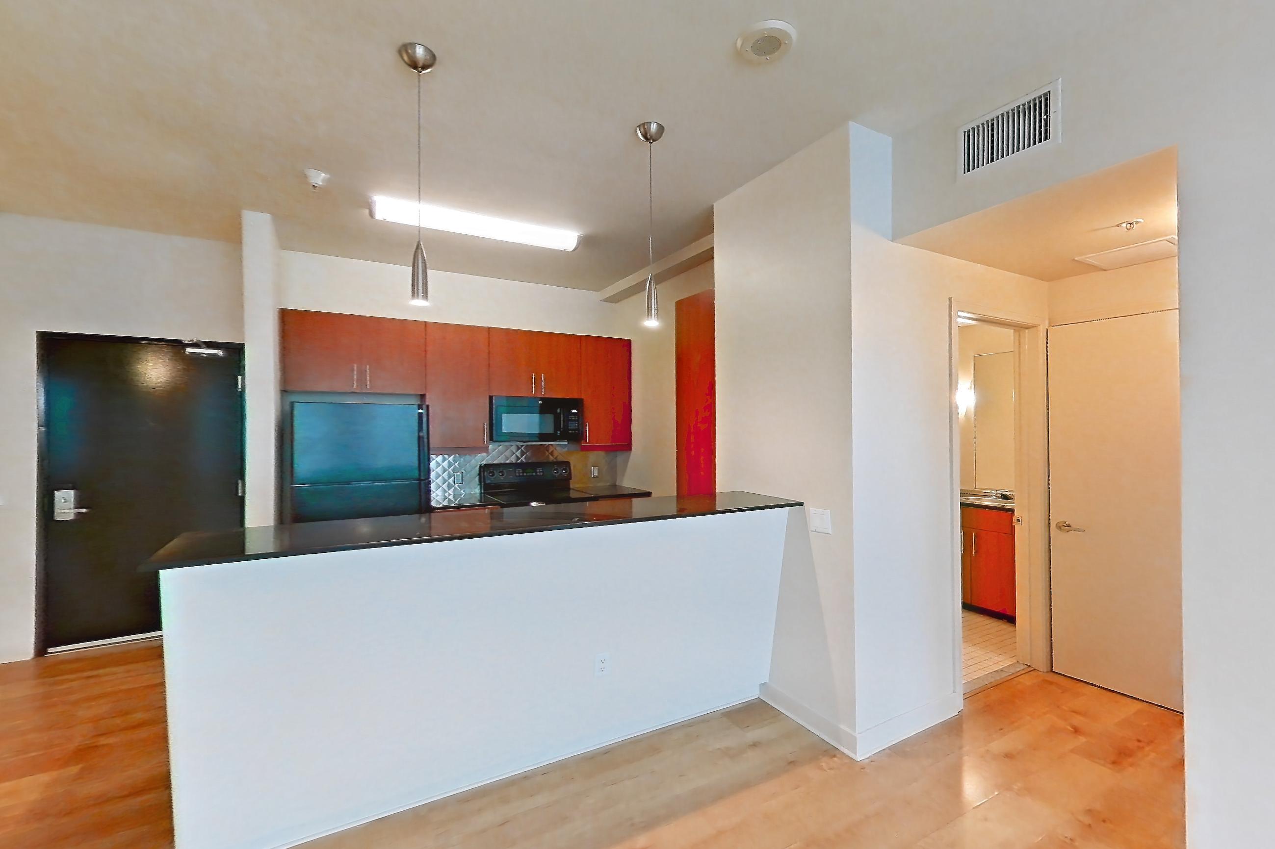 Living room in Apartment 00-0730 at Metro 417, 2B floor plan