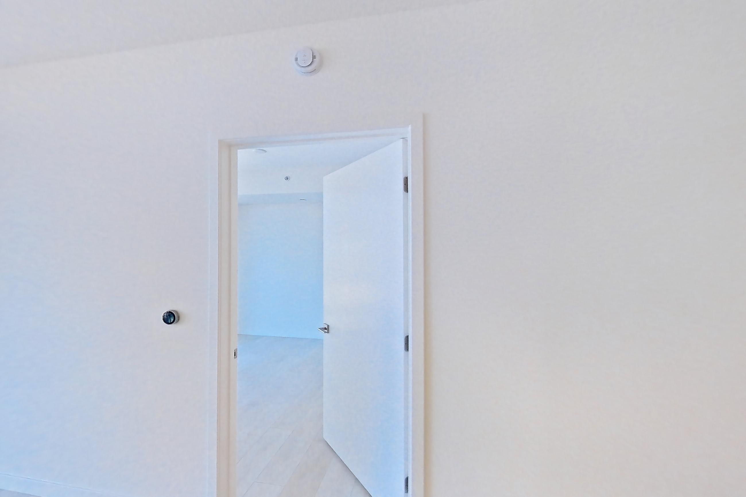 Living room with light wood-finish flooring, Apartment 1210 at Atelier