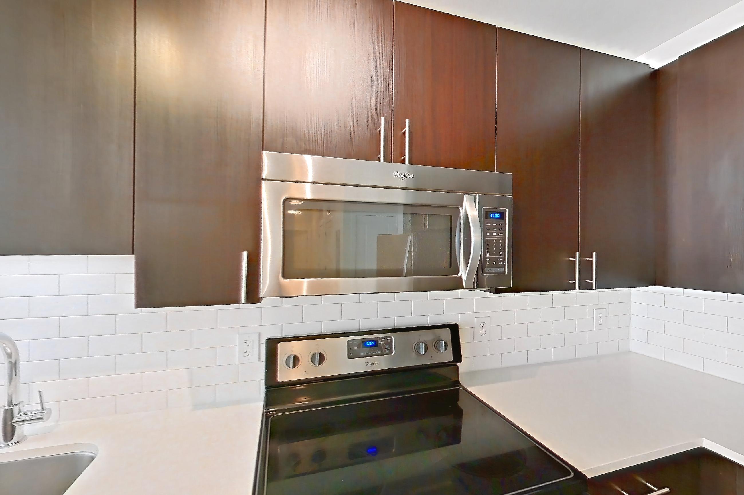 Kitchen in Apartment 1-110 at The Parker at Huntington Metro, 1H floor plan