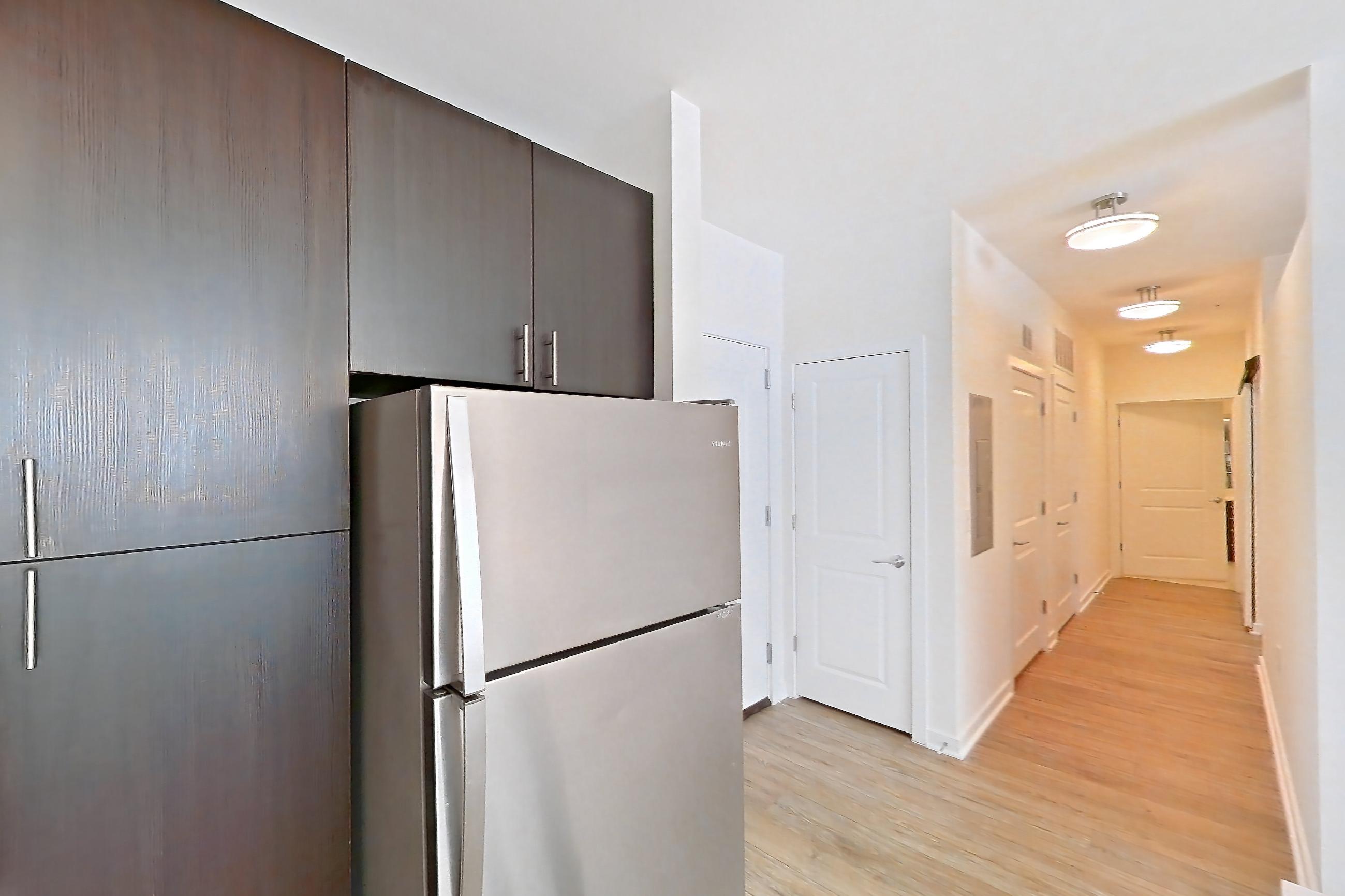 Kitchen in Apartment 1-110 at The Parker at Huntington Metro, 1H floor plan