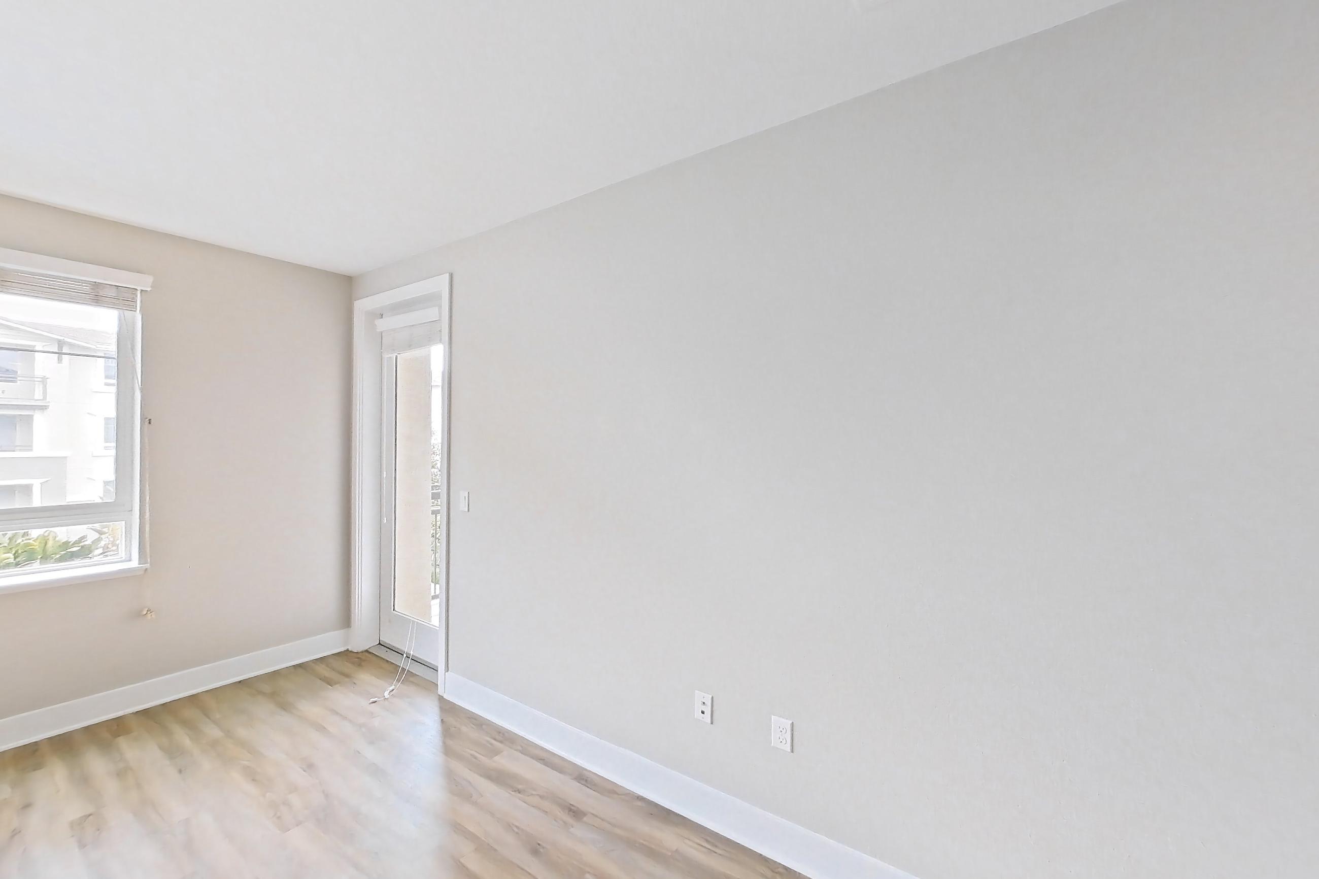 Living room with light wood-finish flooring, Apartment 0-3085 at Alder