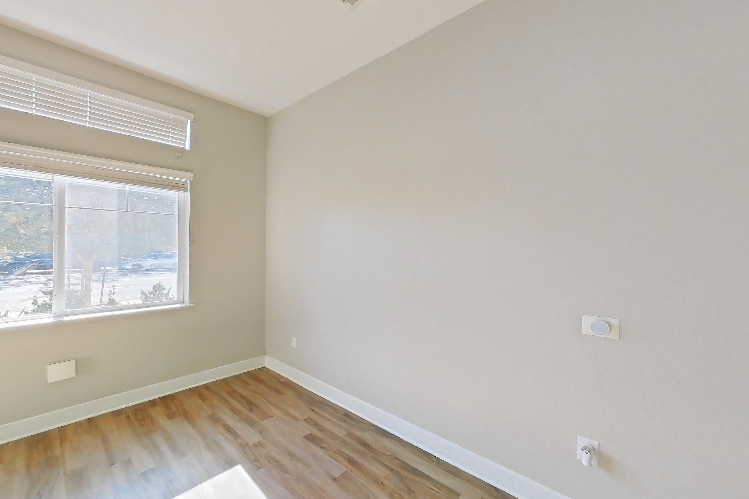 Living room with light wood-finish flooring, Apartment 0-1060 at Alder