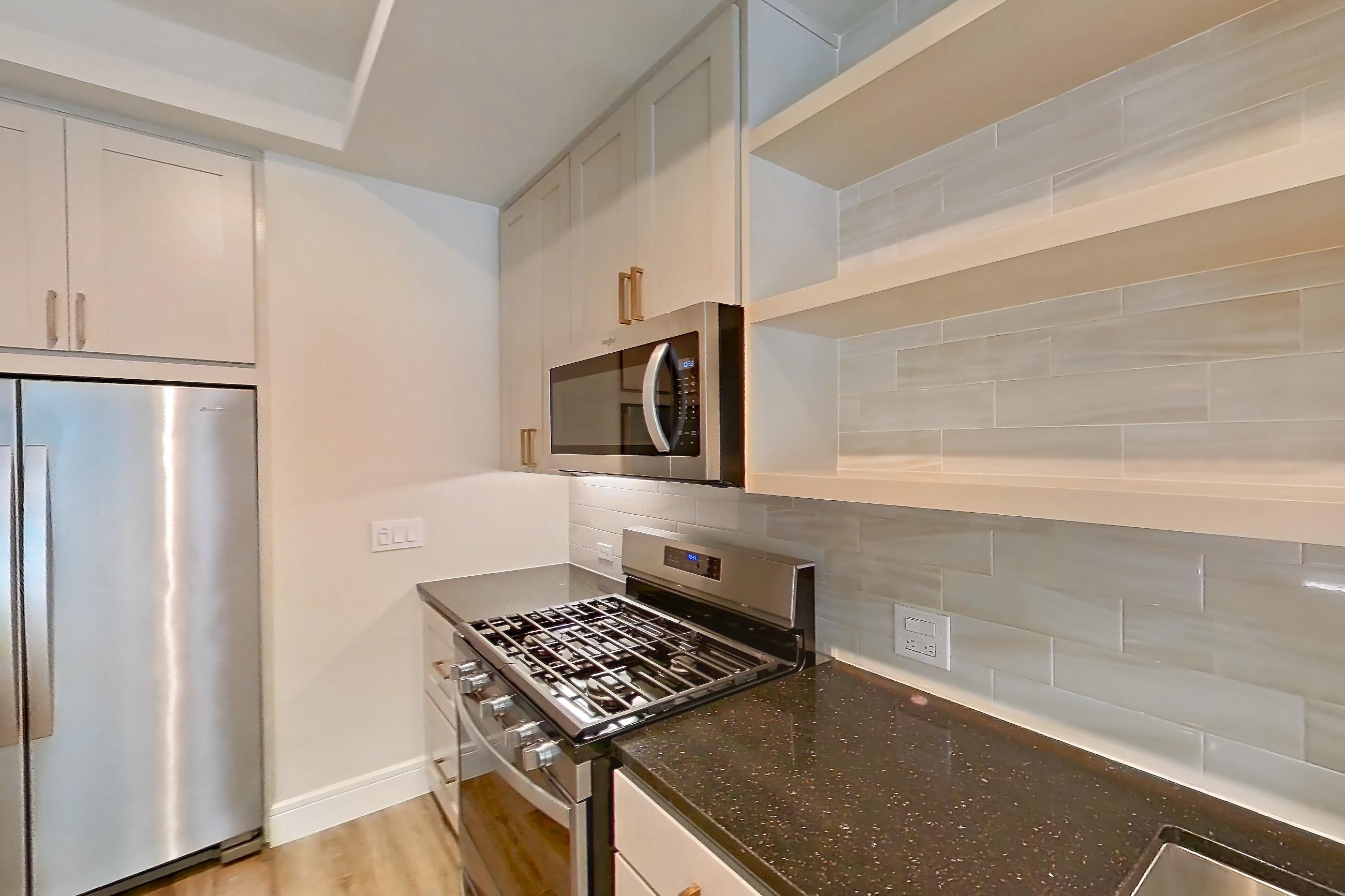 Kitchen in Apartment 251 at Cortland Biltmore, A2 - Charmed floor plan