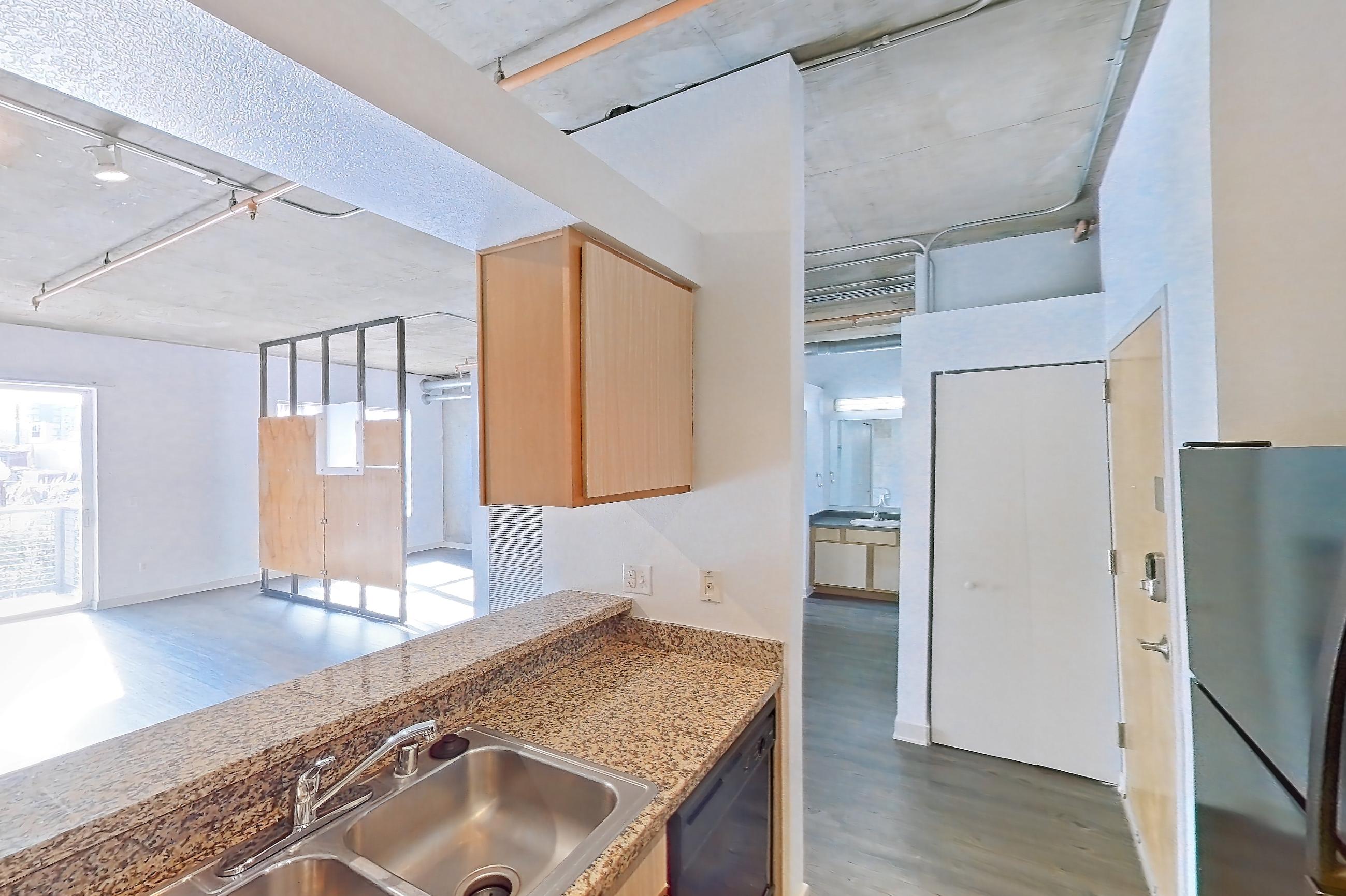 Kitchen in Apartment 1234 at Cortland on Blake, A6 floor plan