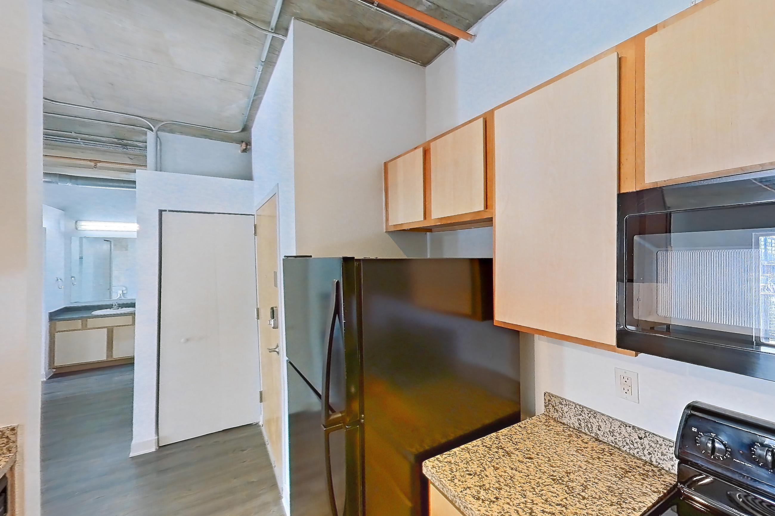 Kitchen in Apartment 1234 at Cortland on Blake, A6 floor plan