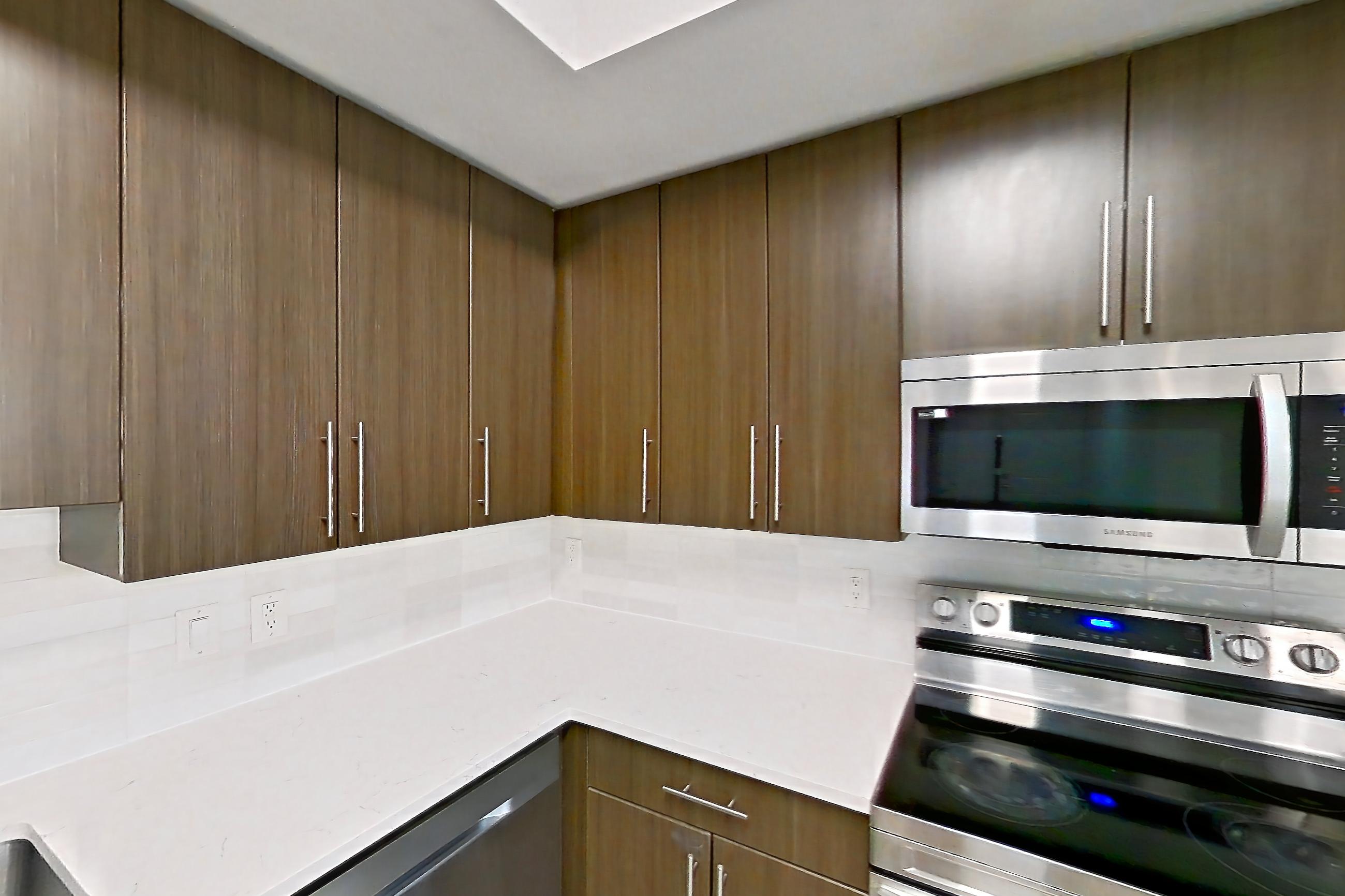 Kitchen in Apartment 12-202 at Cortland West Palm, B1R - Flagler floor plan