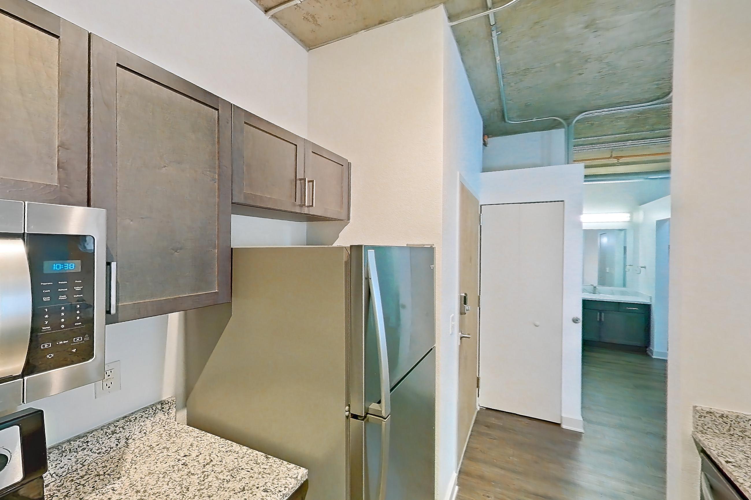 Kitchen in a A6 floor plan apartment, representative of Apartment 1512 at Cortland on Blake