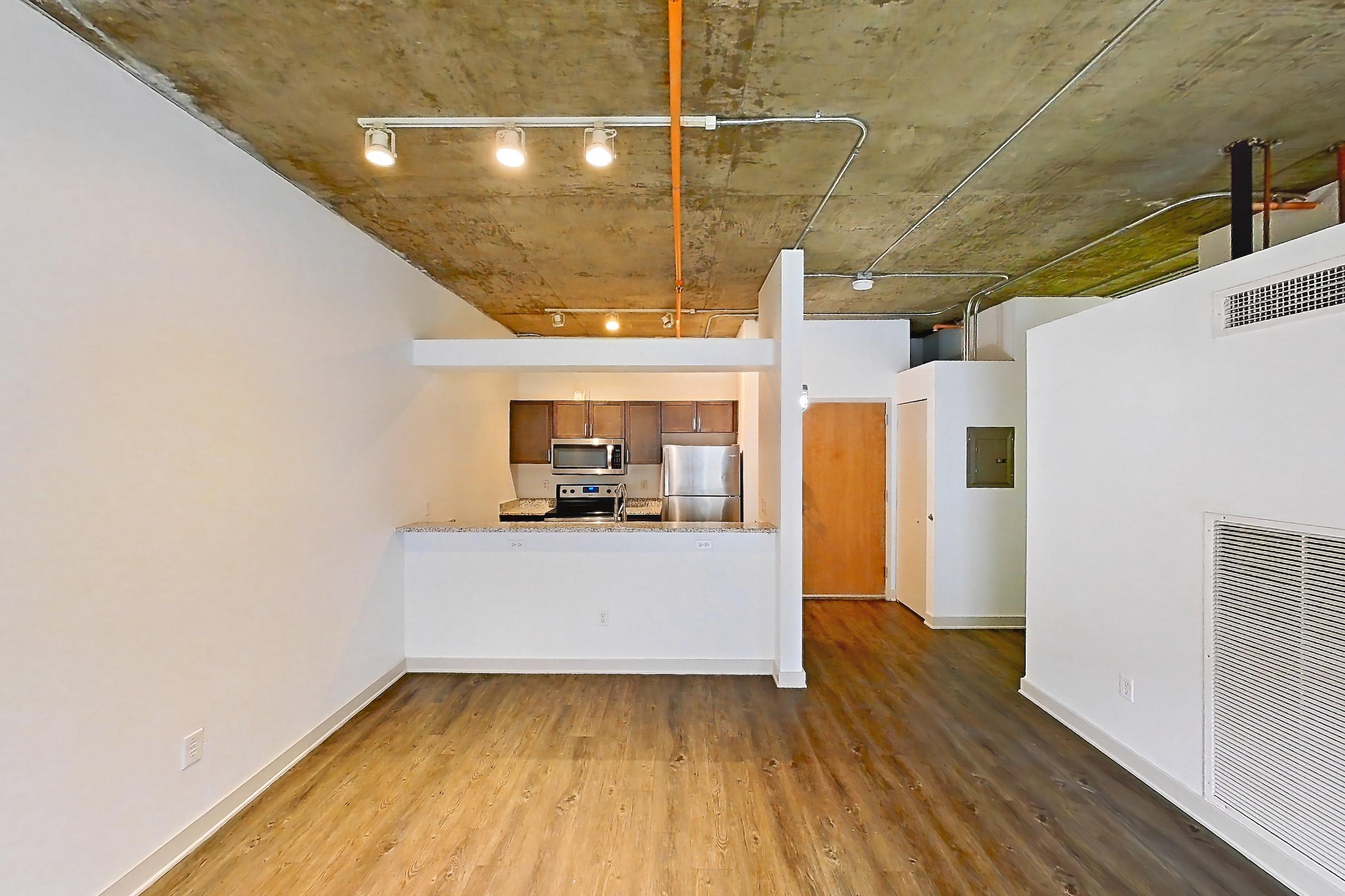 Living space in a A6 floor plan apartment, representative of Apartment 1512 at Cortland on Blake