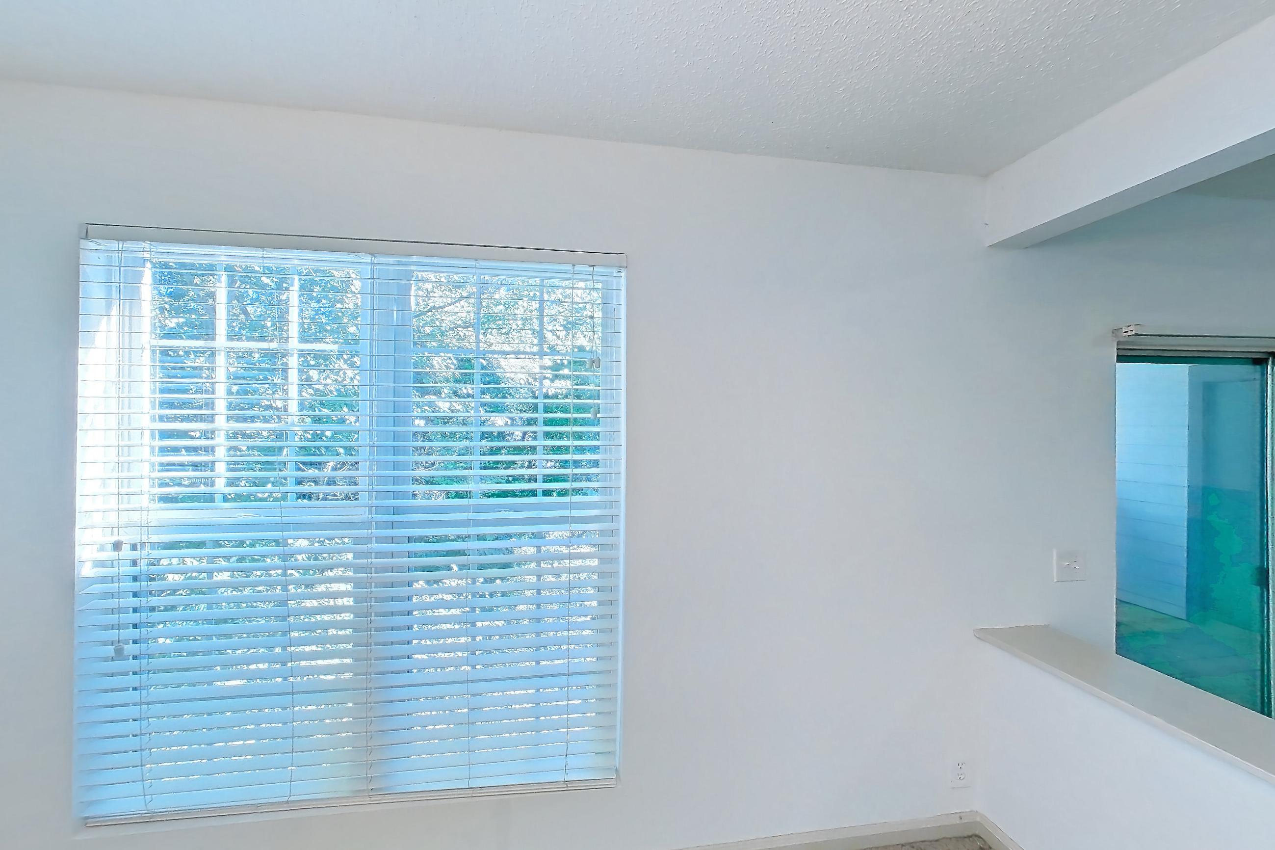 Dining room with fireplace and tile fireplace, Apartment 11 at Cortland Cotswold