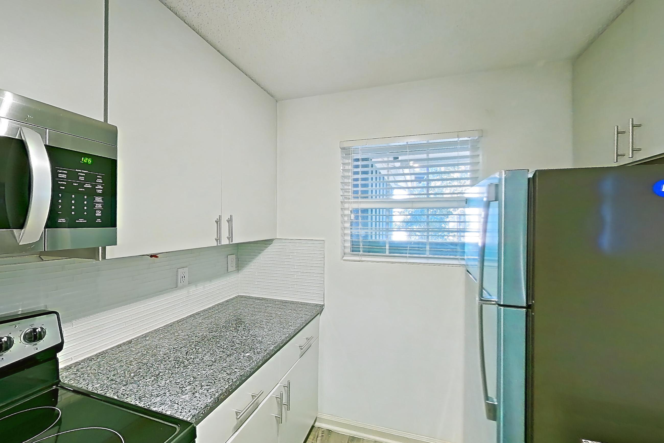 Kitchen in Apartment 11 at Cortland Cotswold, B1 - Myers Park floor plan