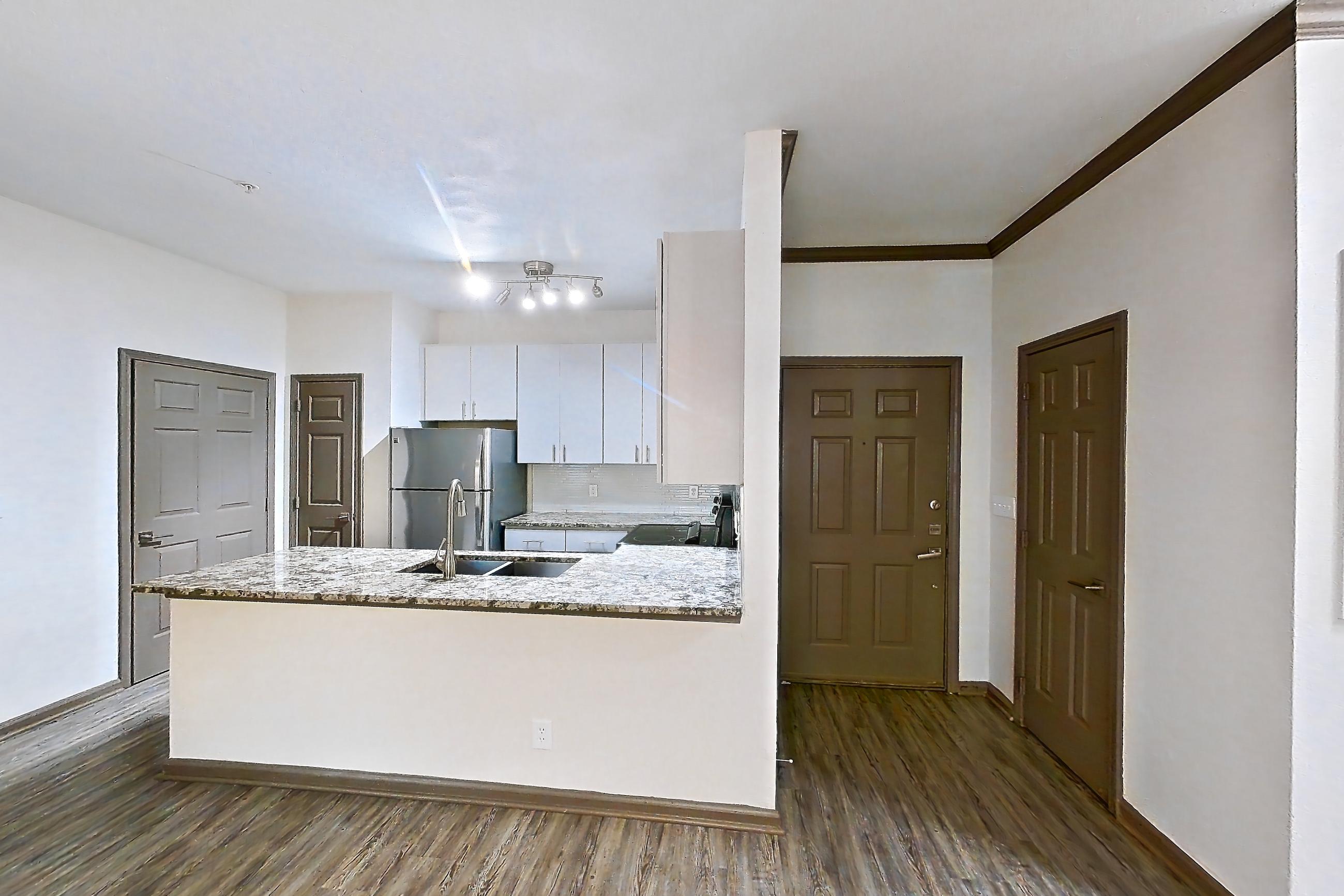 Living space in Apartment 0827 at Cortland Seventy Seven, B2 - Quail Hollow floor plan