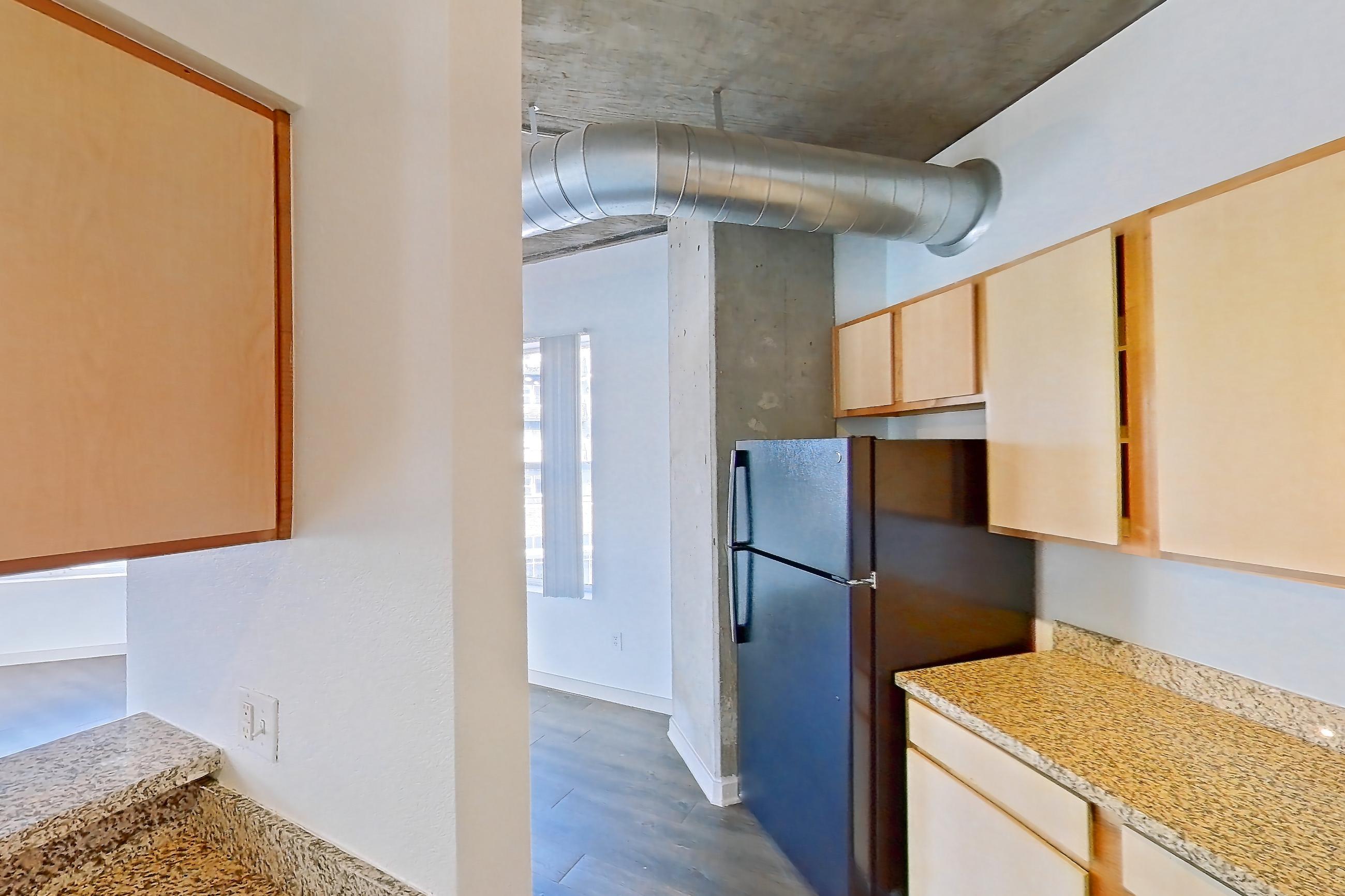 Kitchen in Apartment 1318 at Cortland on Blake, B6 floor plan