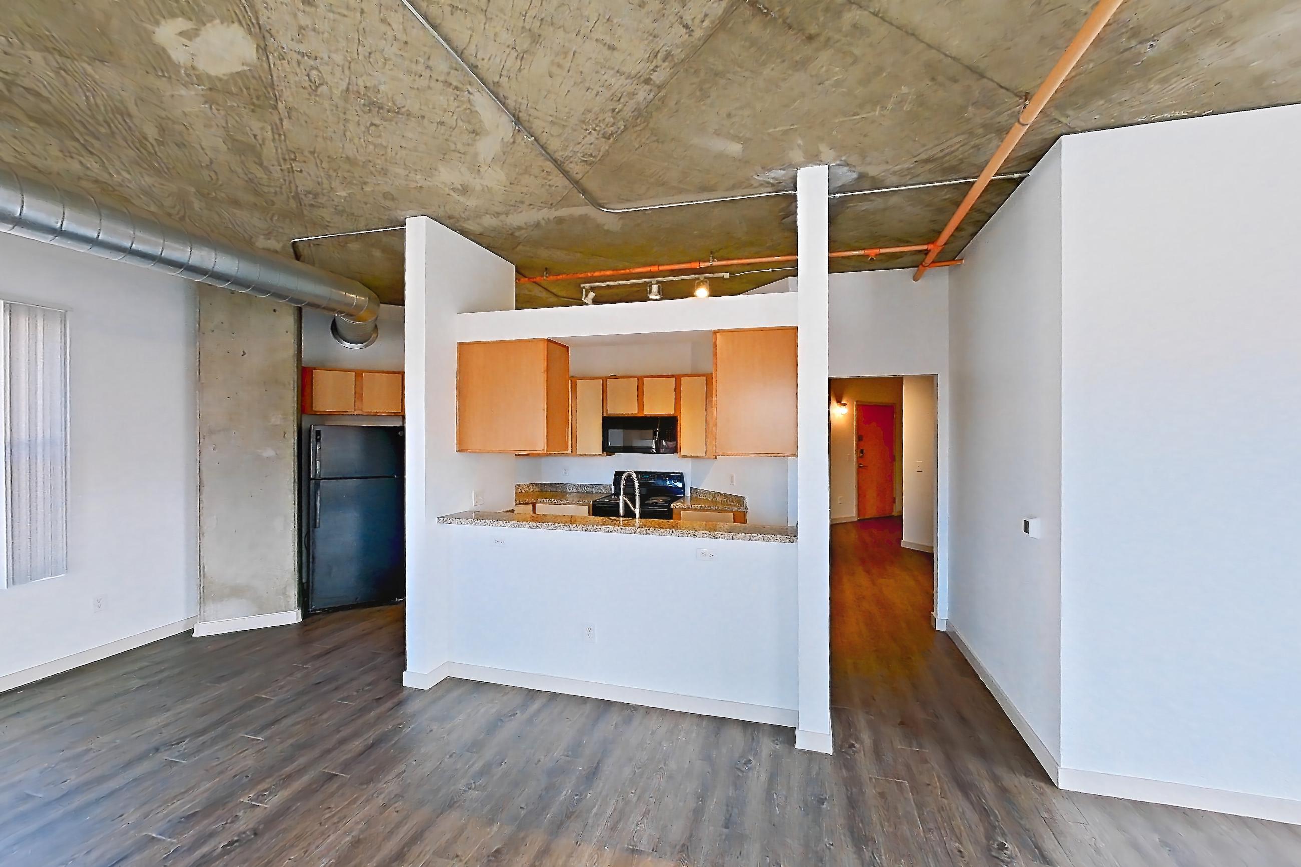 Living space in Apartment 1318 at Cortland on Blake, B6 floor plan