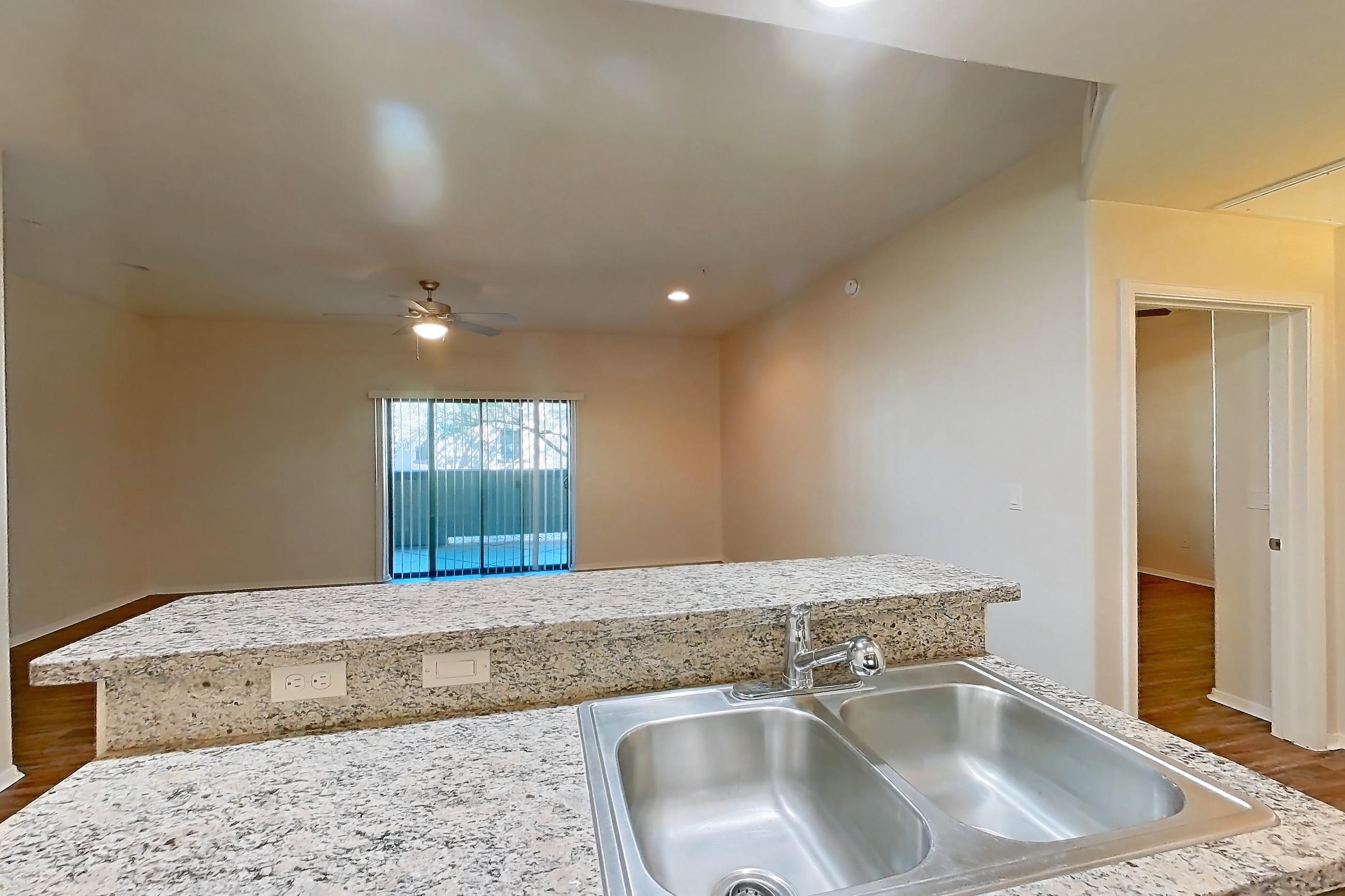 Kitchen in Apartment 12104 at Cortland on the Loop, A1R - The River floor plan