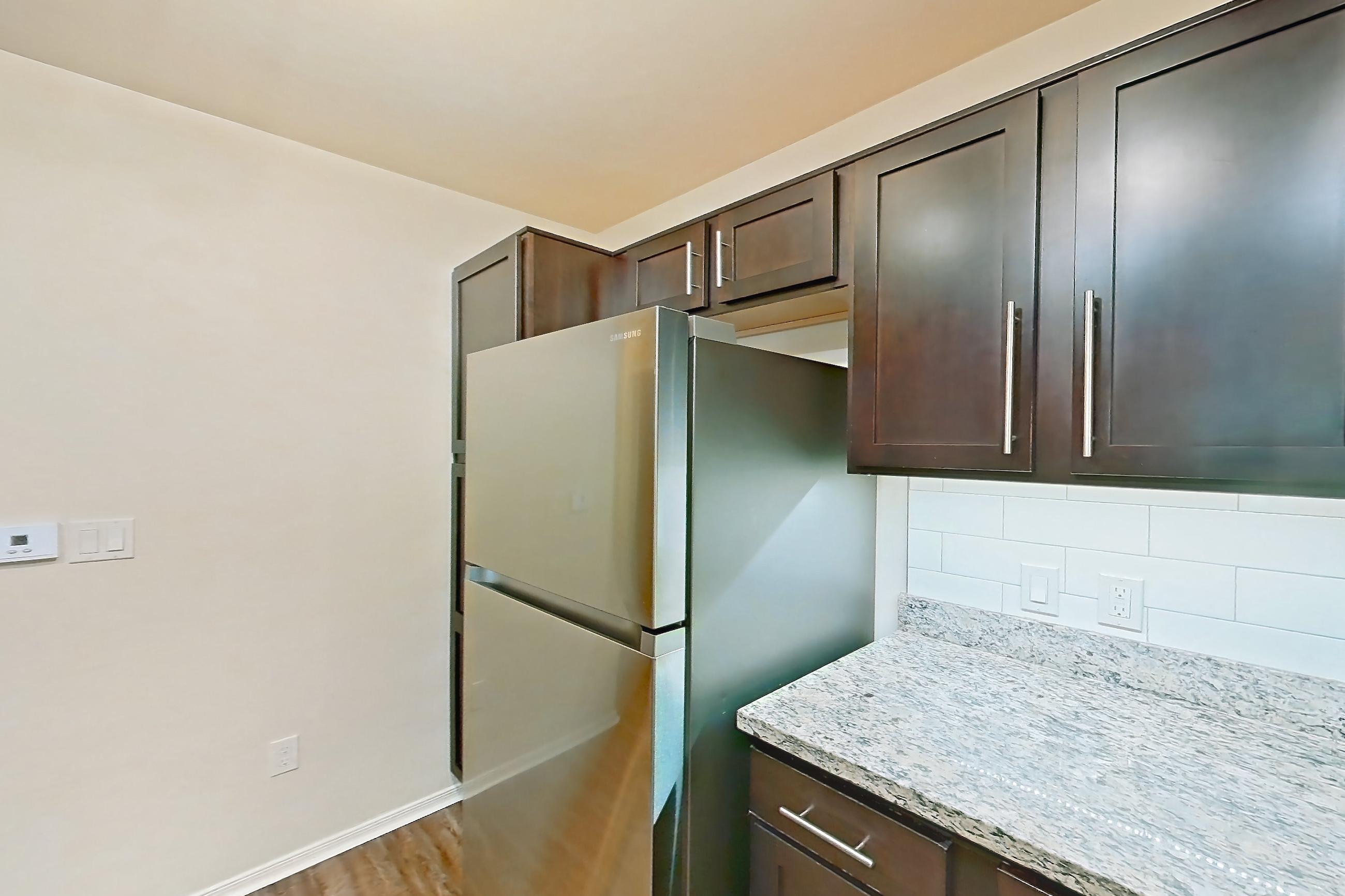 Kitchen in Apartment 12104 at Cortland on the Loop, A1R - The River floor plan