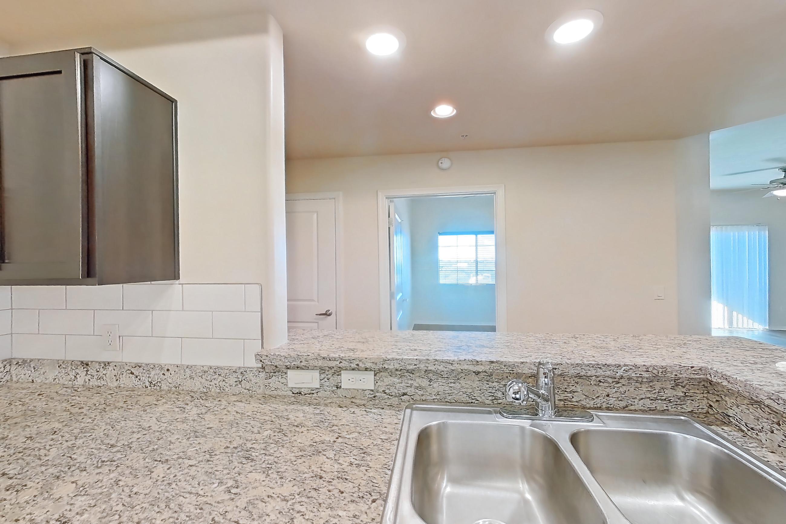 Kitchen in Apartment 09307 at Cortland on the Loop, C1R - The Peak floor plan