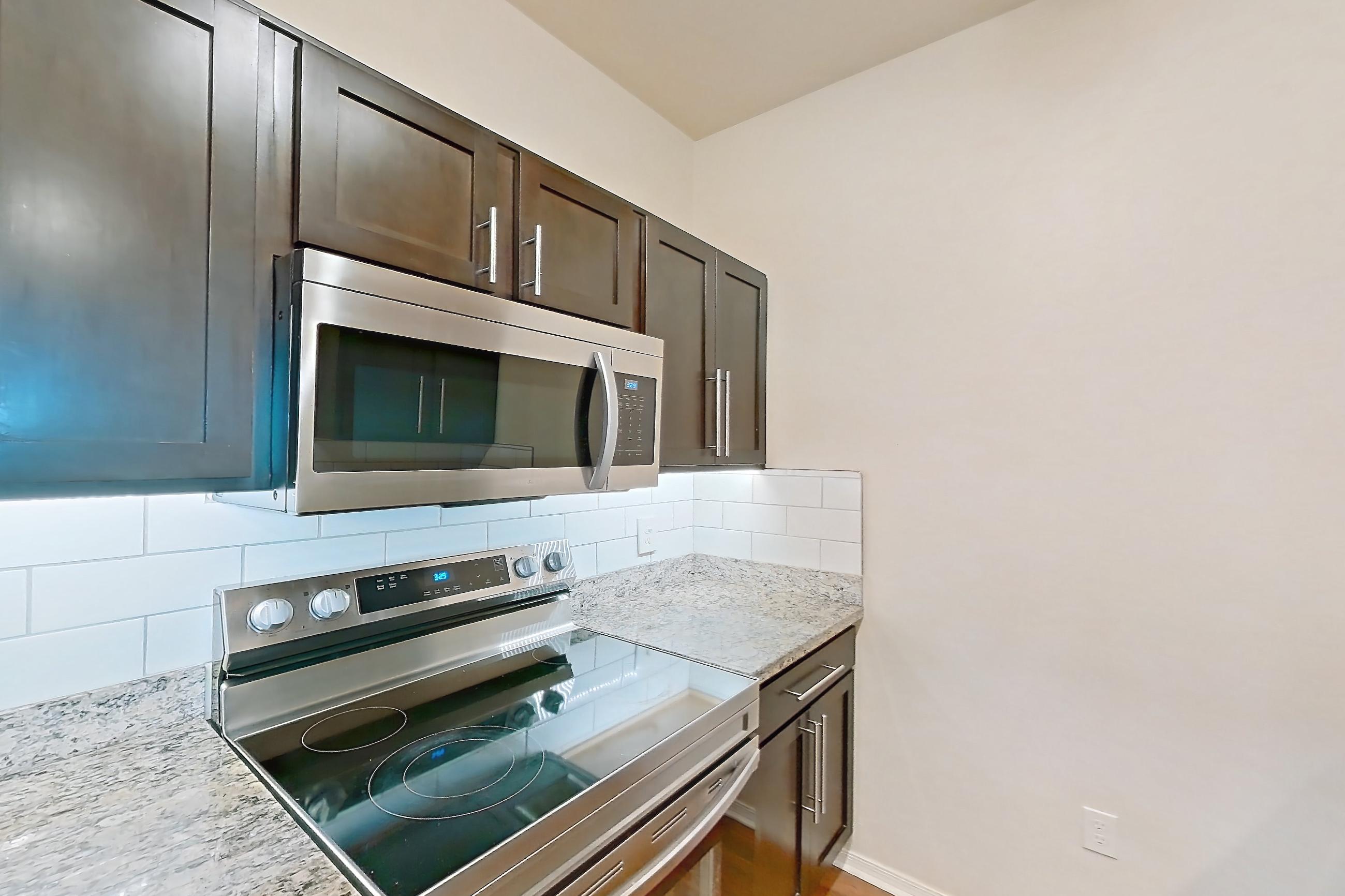 Kitchen in Apartment 09307 at Cortland on the Loop, C1R - The Peak floor plan