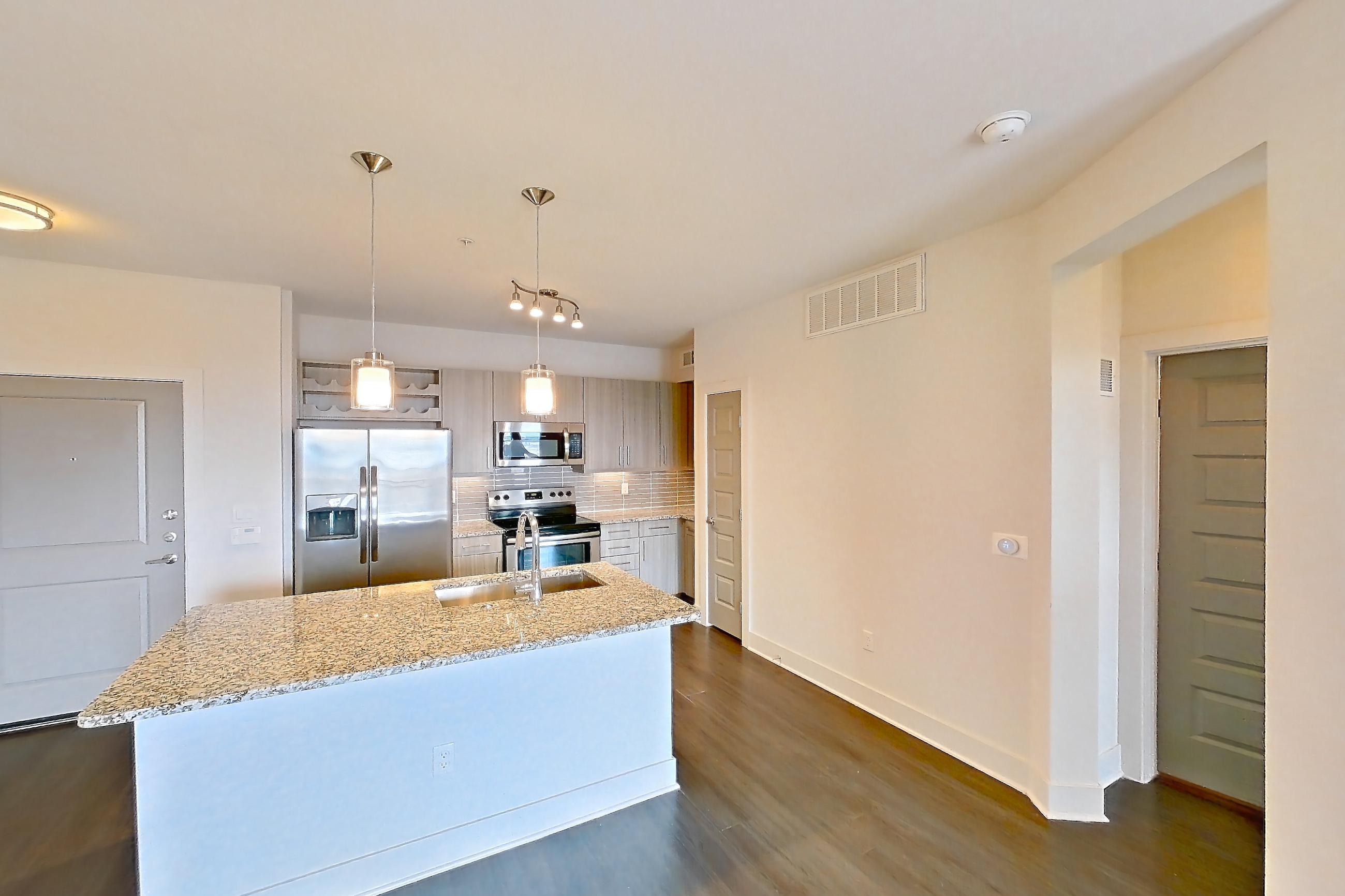 Living space in Apartment 1420 at Cortland at Coalton, A1 - Mt Bierstadt floor plan