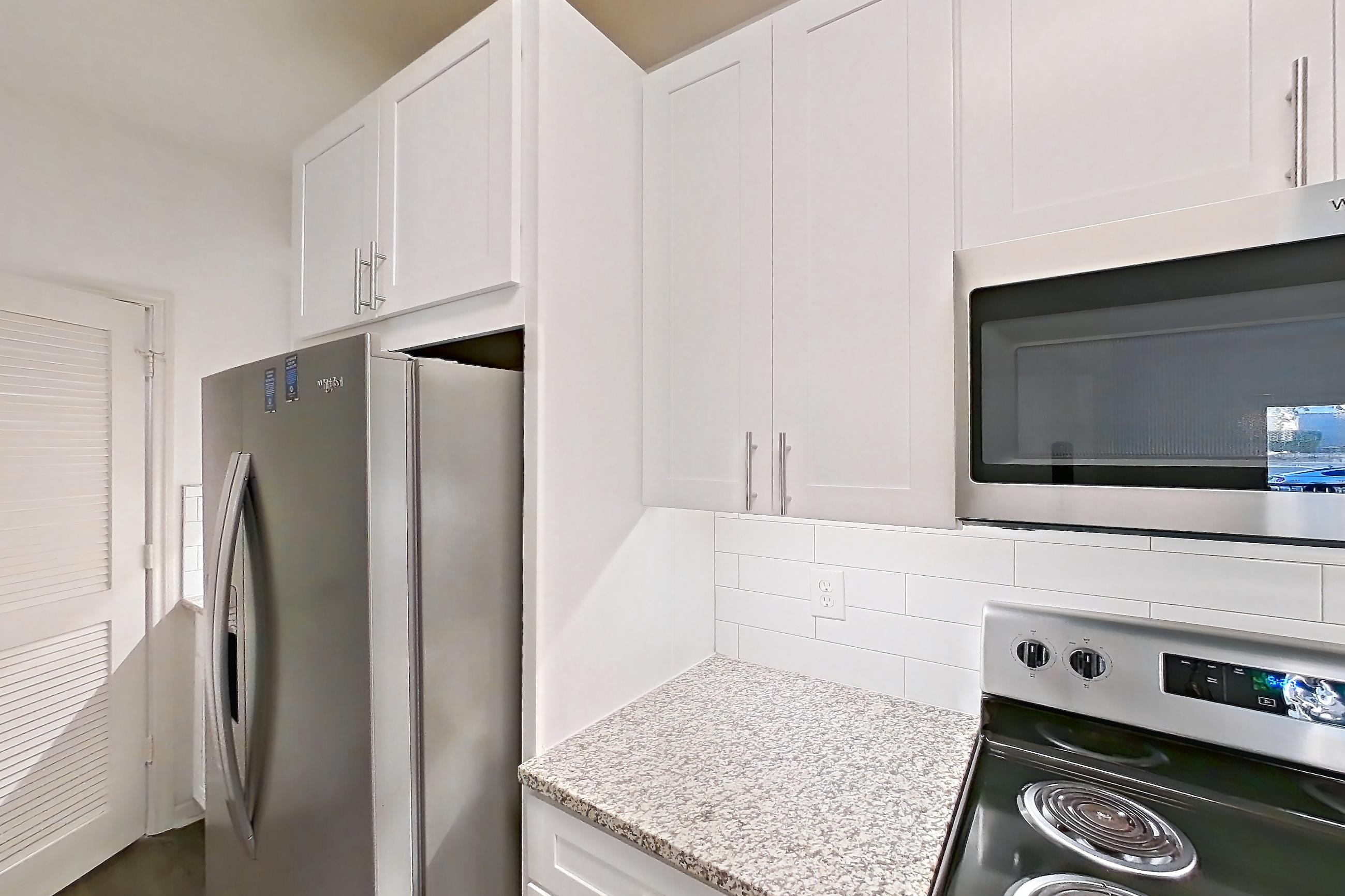 Kitchen in Apartment 1118 at Cortland Ridglea, B3R - Sunset floor plan