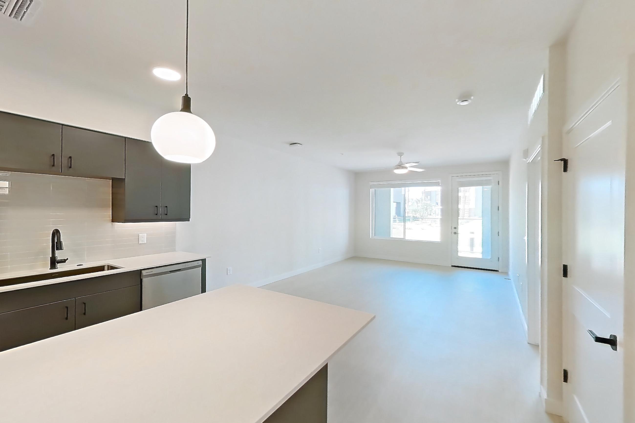 Dining room with light wood-finish flooring, Apartment 1138 at Navona