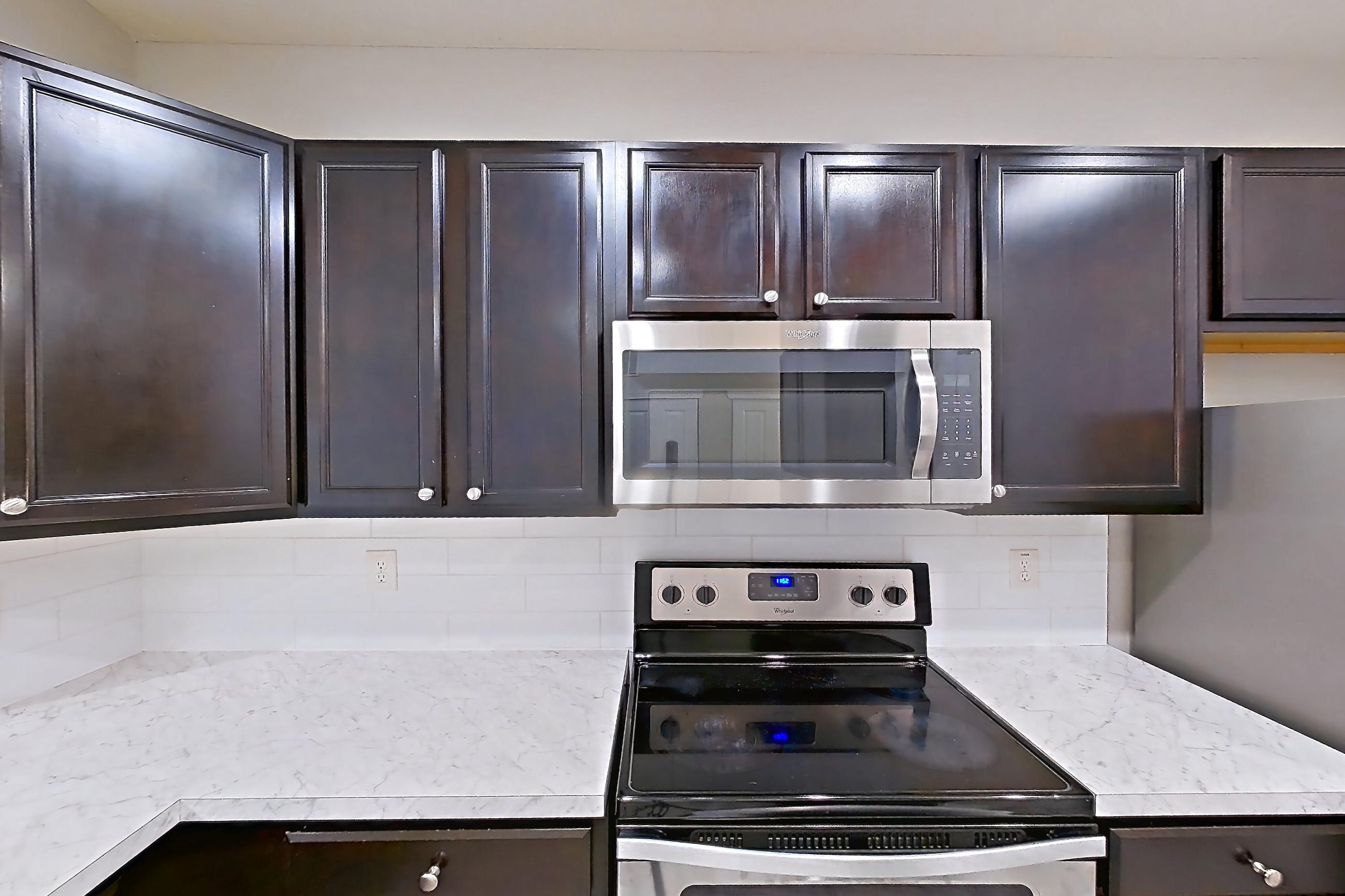 Kitchen in Apartment h9045 at Cortland Powell, B2R - Summit floor plan