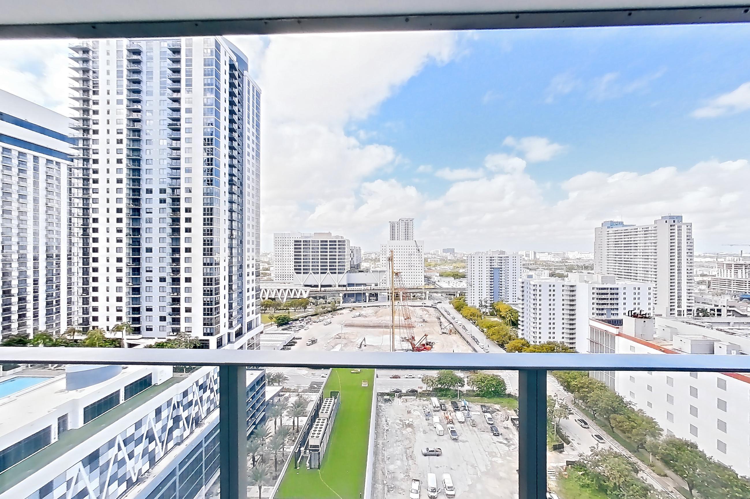 Balcony west living room with city view, Apartment 2415 at Miami World Tower