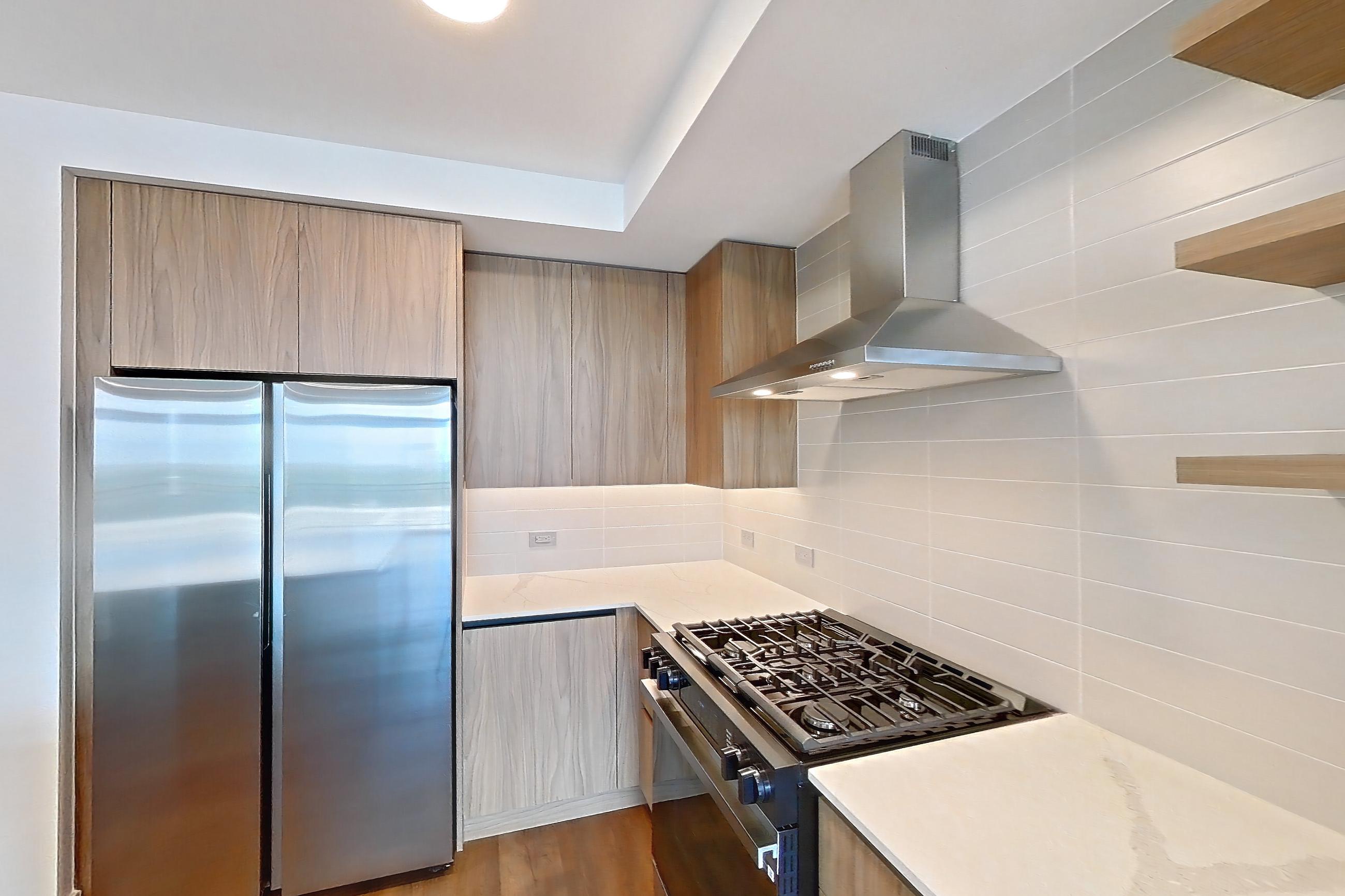 Kitchen with range hood, Apartment 0708 at Rone Residences