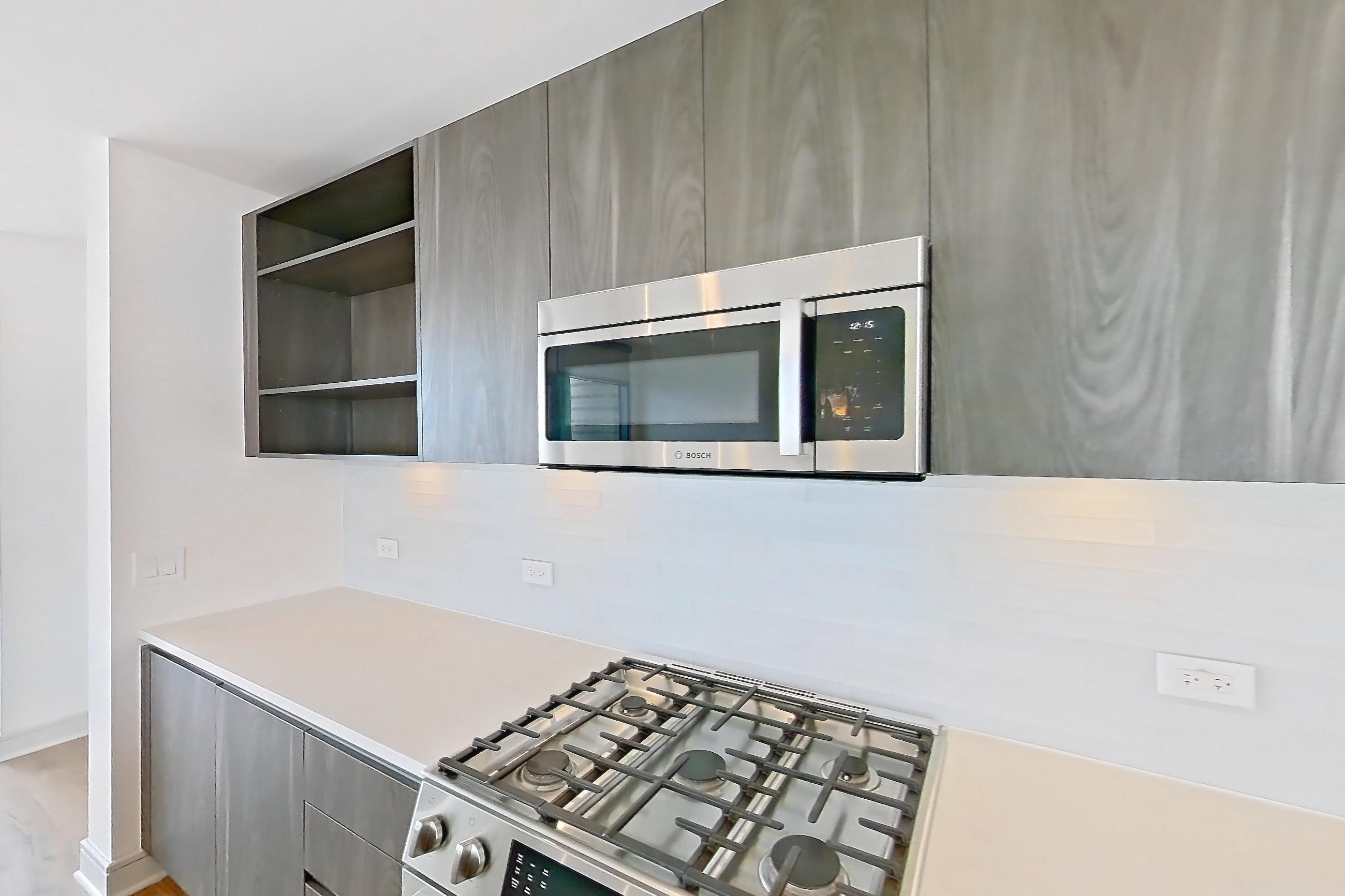 Kitchen in a B1 floor plan apartment, representative of Apartment 1704 at The Residences at La Colombe d'Or