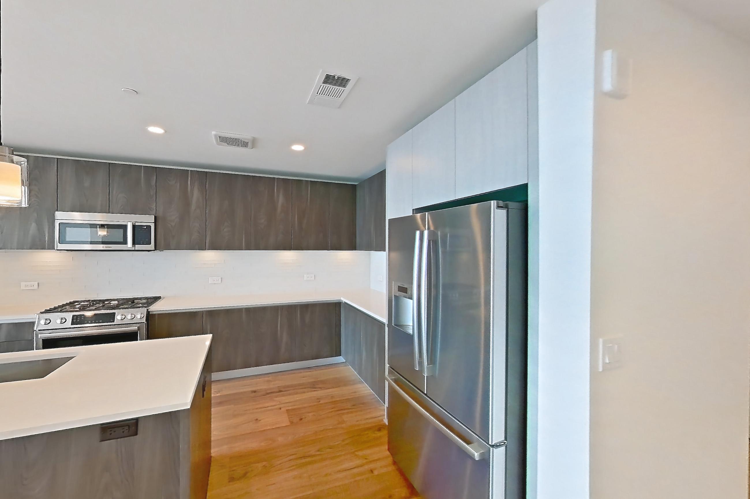 Kitchen space in a A7 floor plan apartment, representative of Apartment 1509 at The Residences at La Colombe d'Or