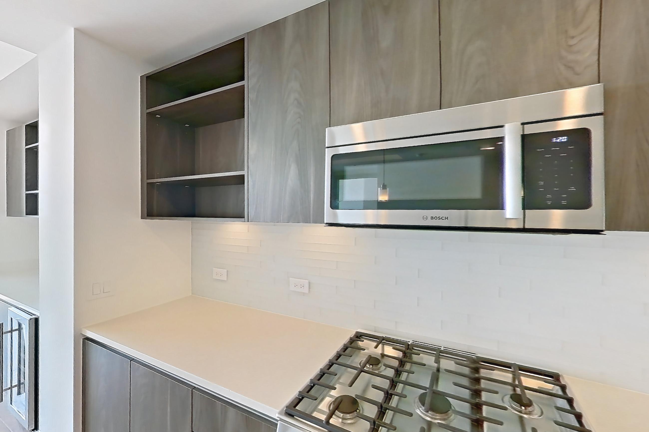 Kitchen in a A7 floor plan apartment, representative of Apartment 1509 at The Residences at La Colombe d'Or