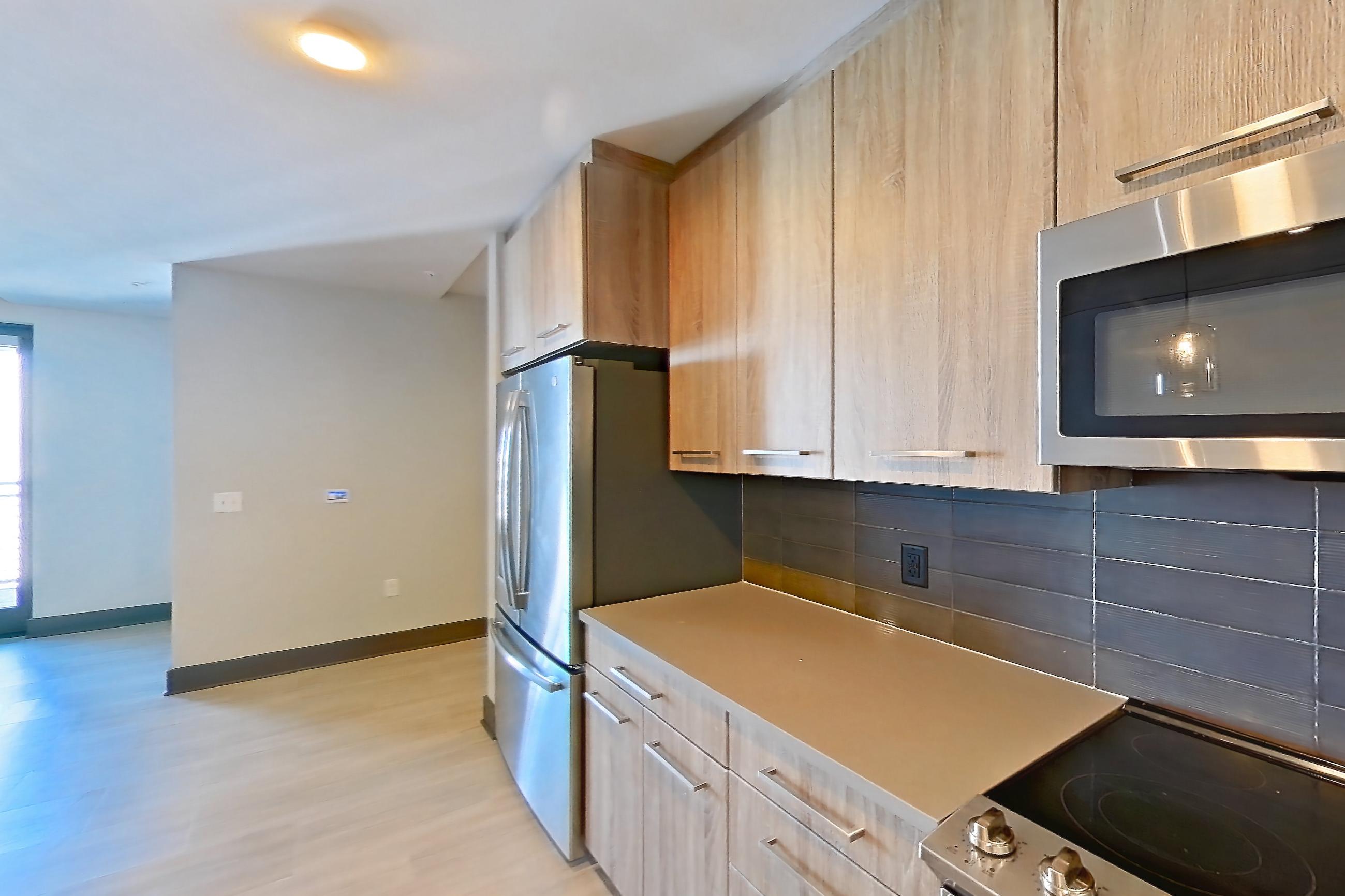 Kitchen in Apartment 1131 at Cortland Glenwood South, A38 floor plan
