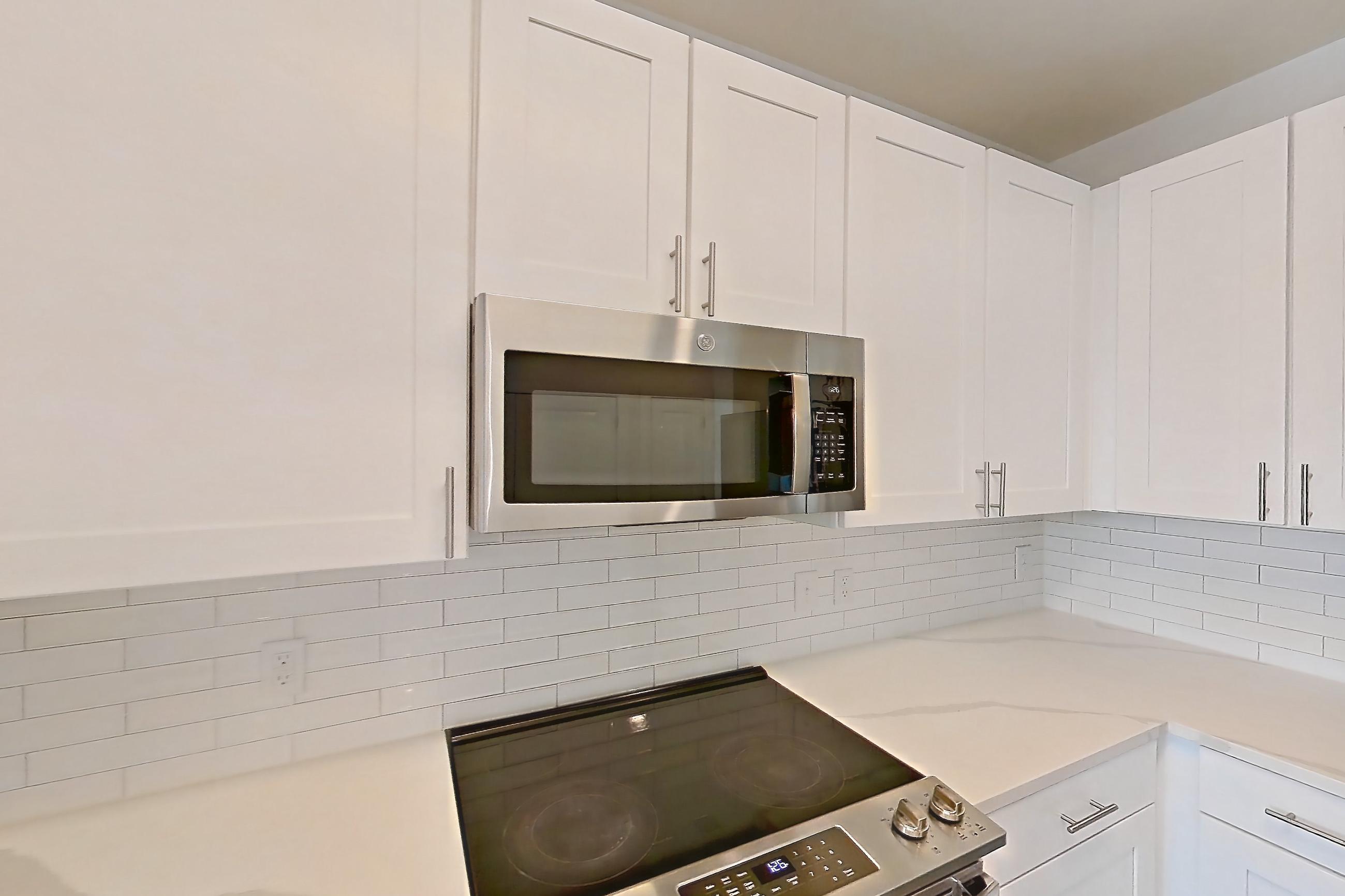 Kitchen in a 1B floor plan apartment, representative of Apartment 11107 at Embree Hill