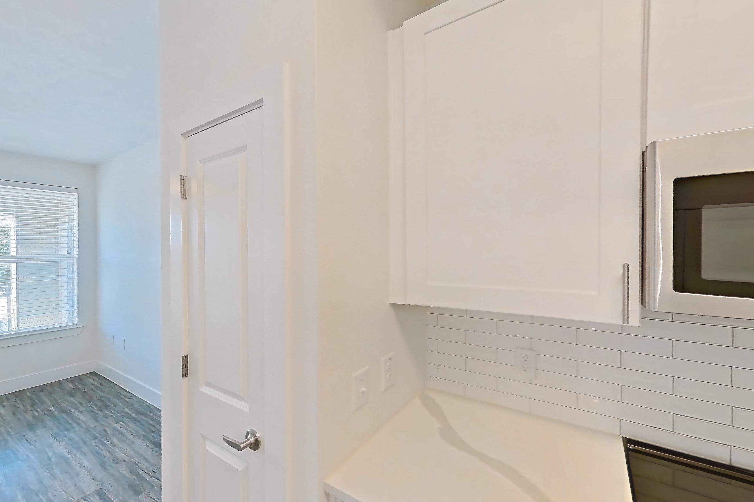 Kitchen in a 1B floor plan apartment, representative of Apartment 11107 at Embree Hill