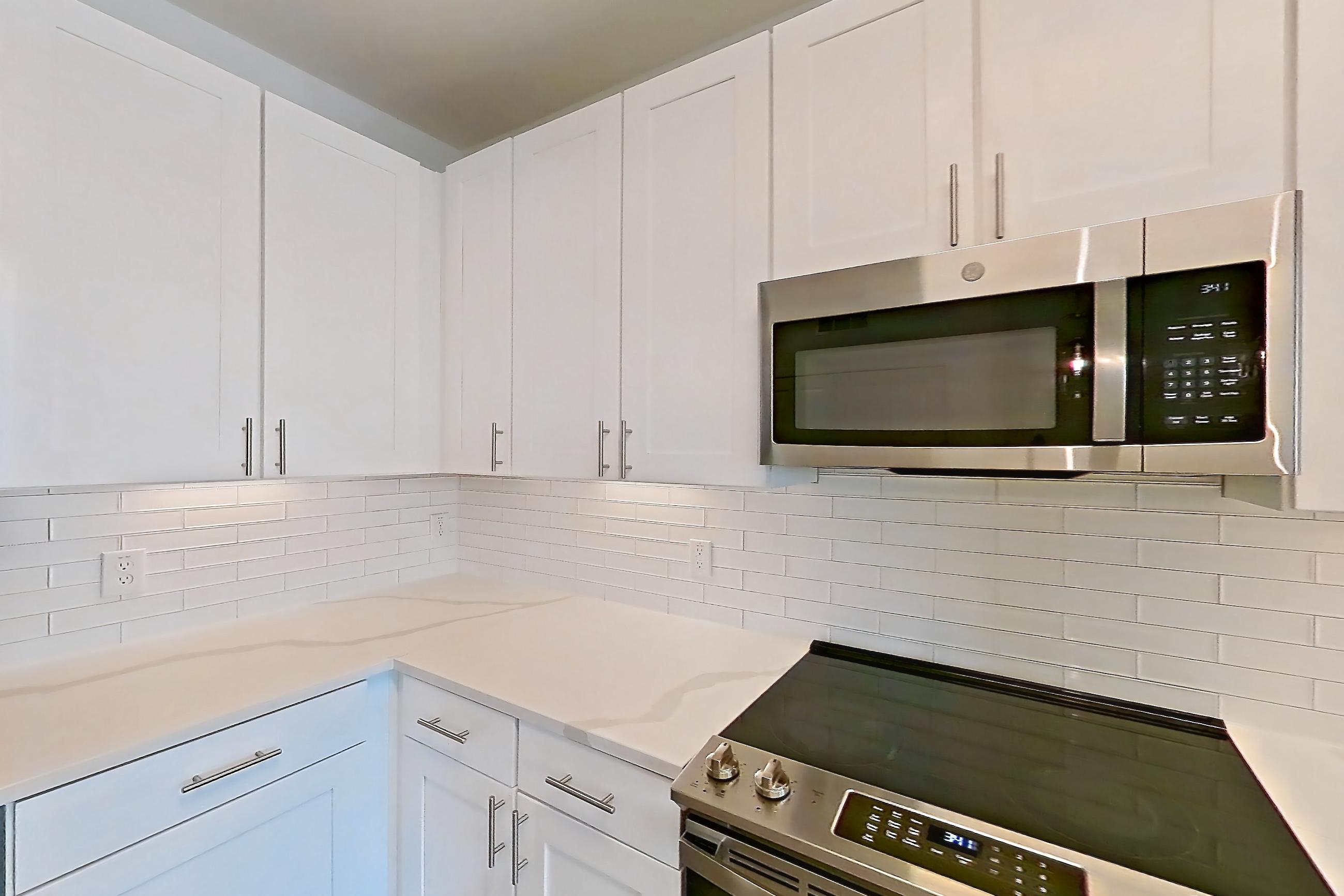 Kitchen in a 1C floor plan apartment, representative of Apartment 06205 at Embree Hill