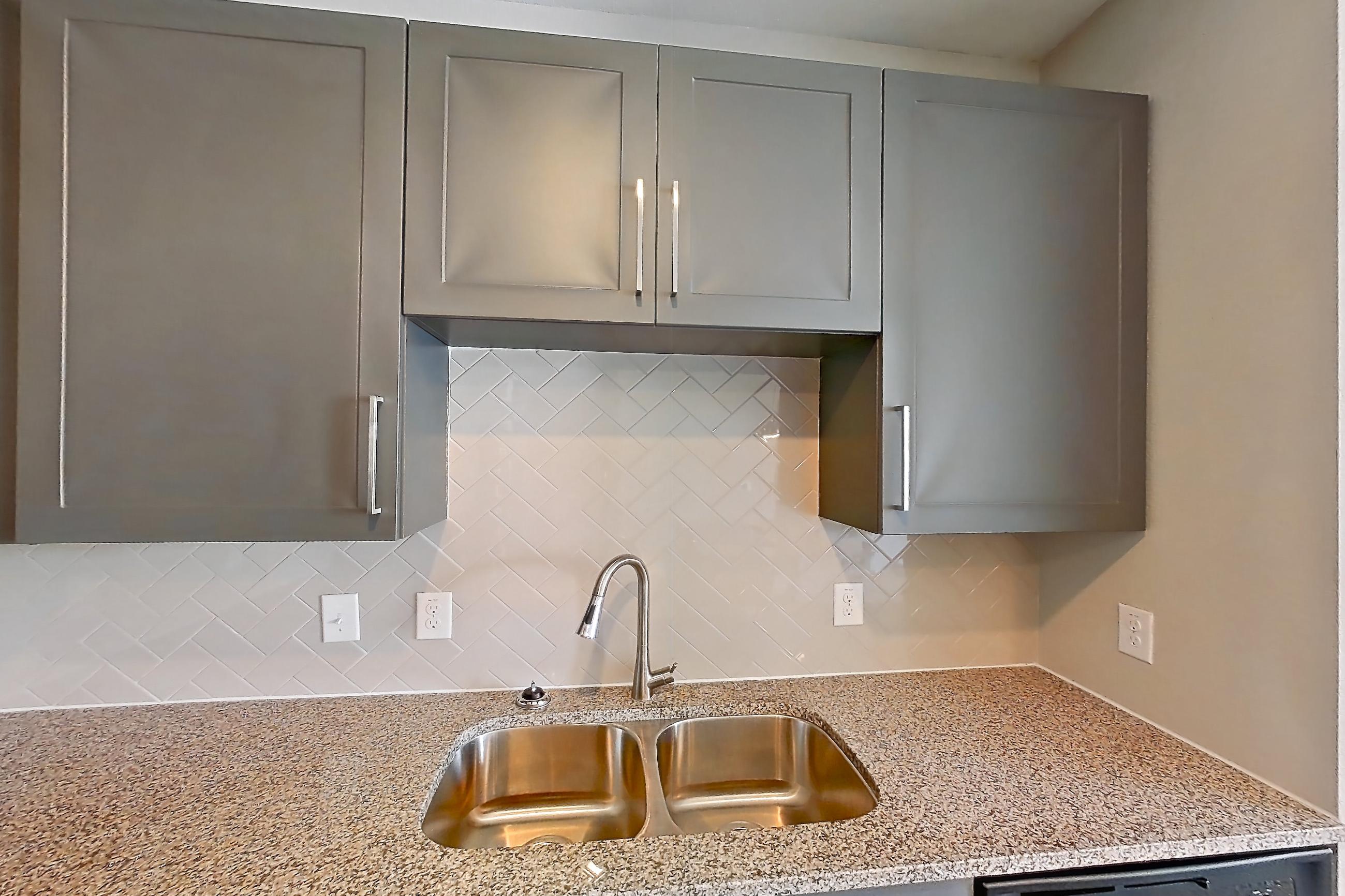 Kitchen in a 2C floor plan apartment, representative of Apartment 01209 at Embree Hill