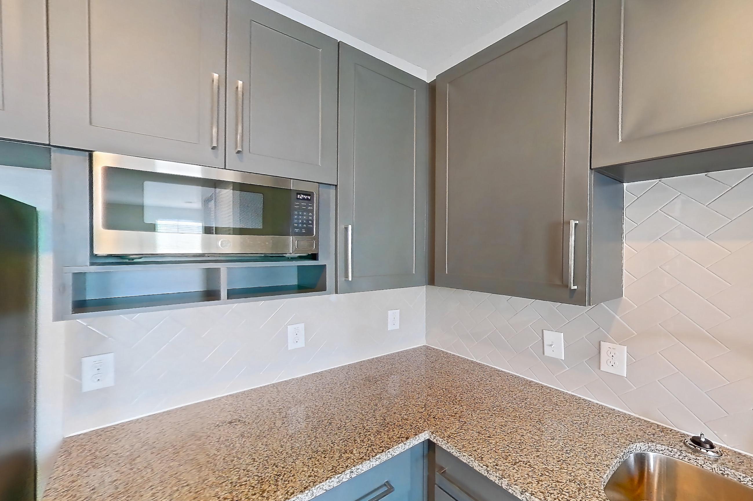 Kitchen in a 2C floor plan apartment, representative of Apartment 01209 at Embree Hill