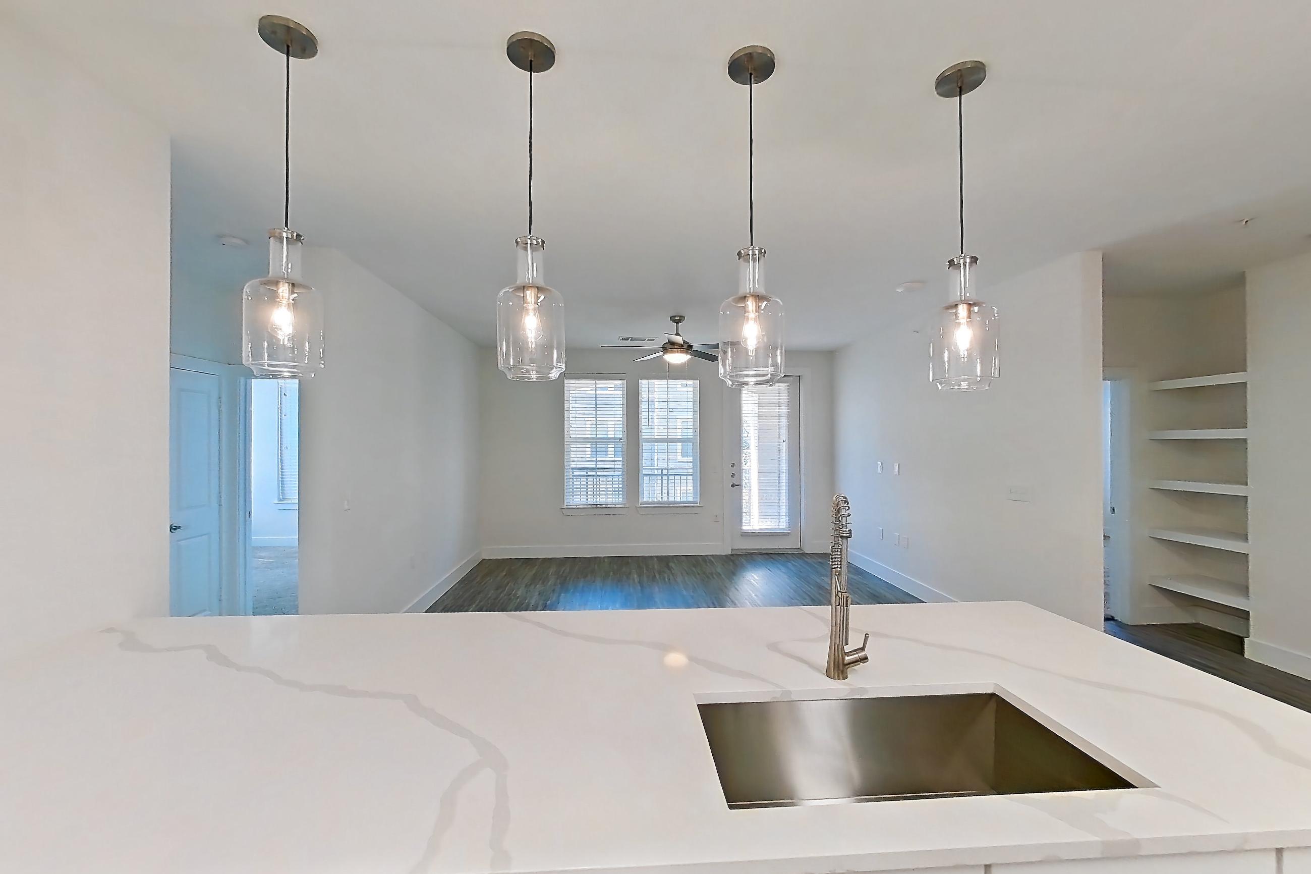 Kitchen in a 3C floor plan apartment, representative of Apartment 13209 at Embree Hill