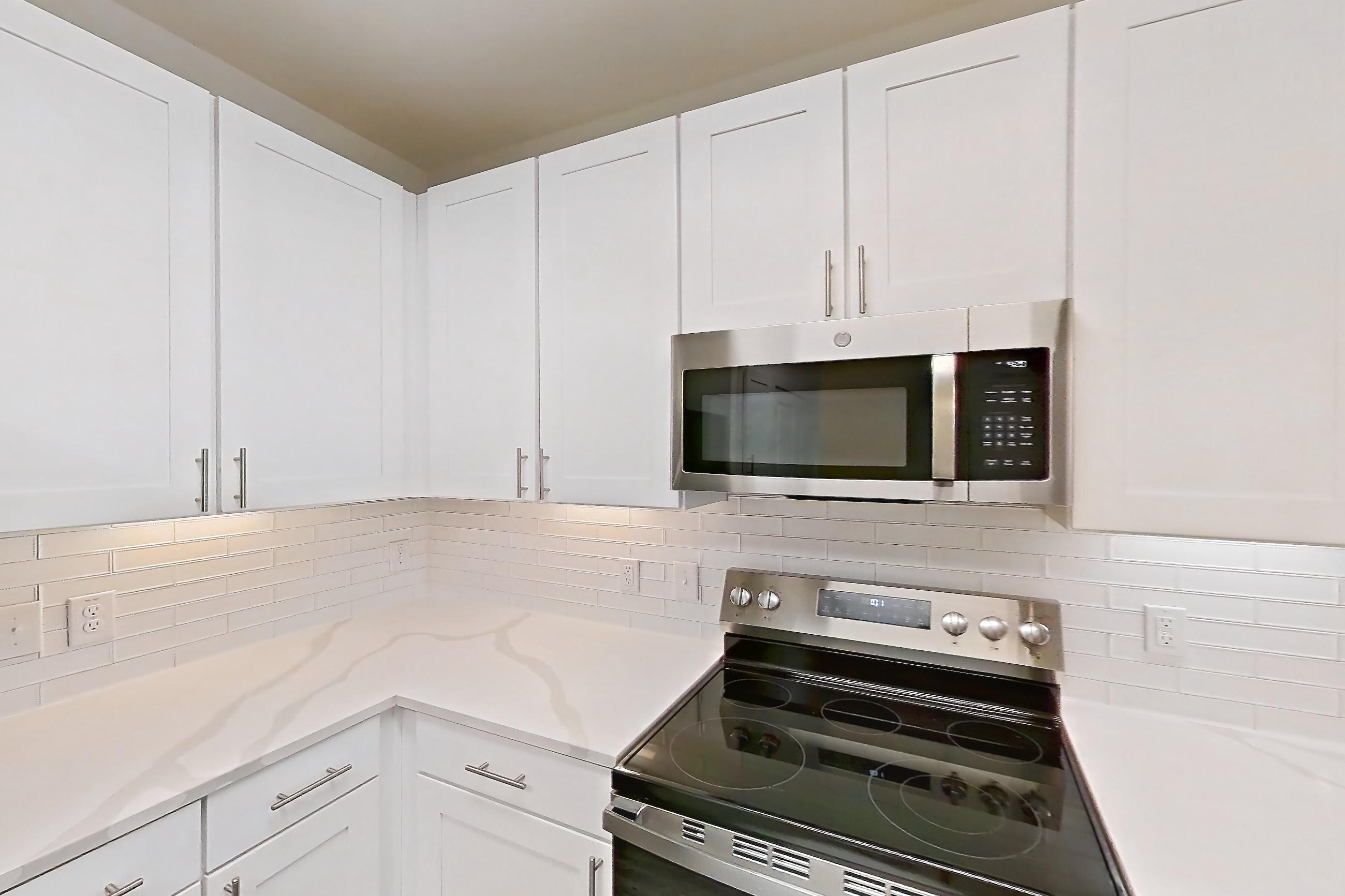 Kitchen in a 3C floor plan apartment, representative of Apartment 13209 at Embree Hill