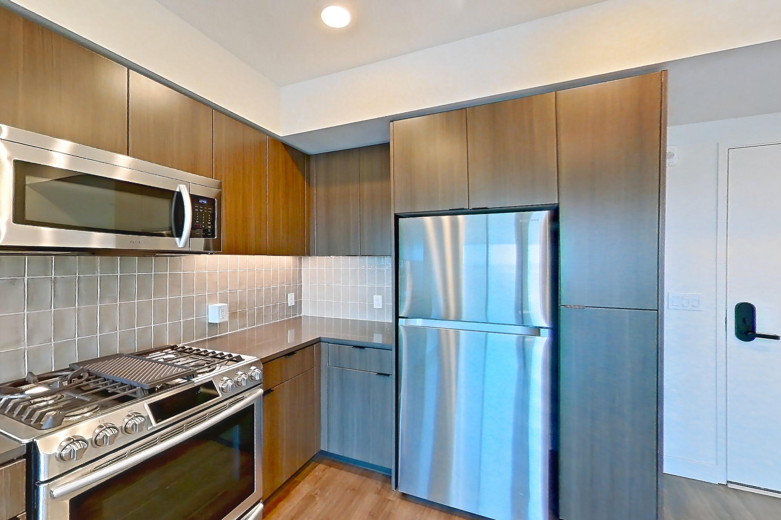 Kitchen in Apartment 0-787 at Webster Eleven, 1C floor plan