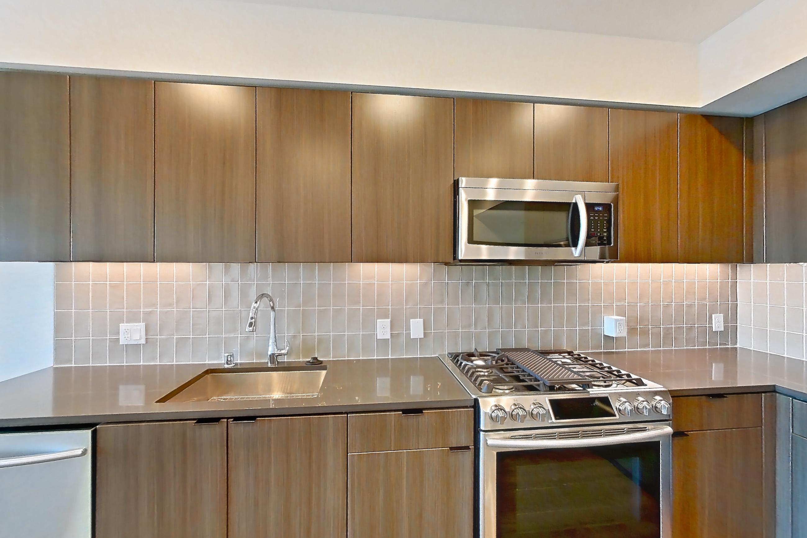 Kitchen in Apartment 0-787 at Webster Eleven, 1C floor plan