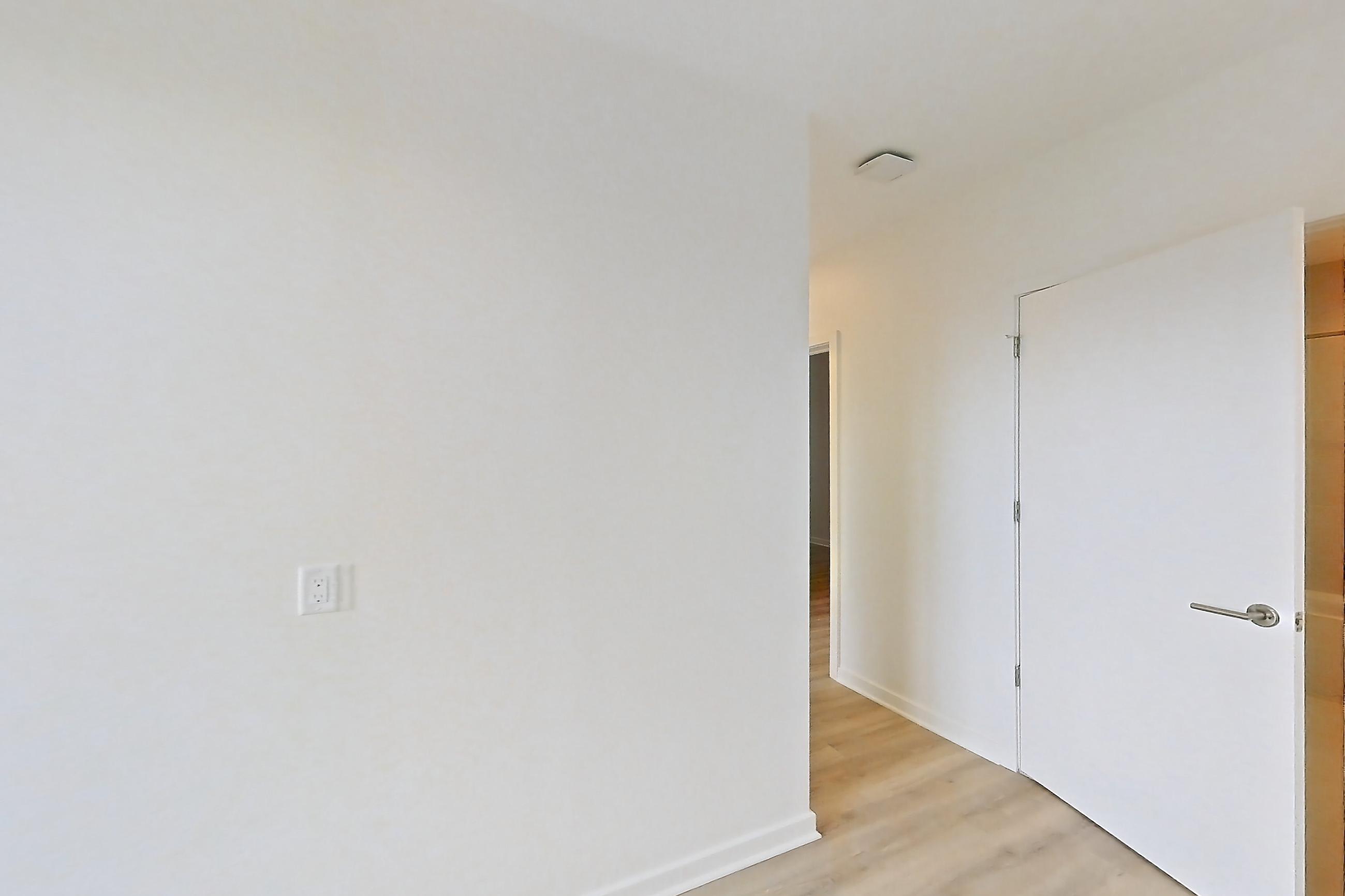 Dining room with light wood-finish flooring, Apartment 303 at Residences at Mazza