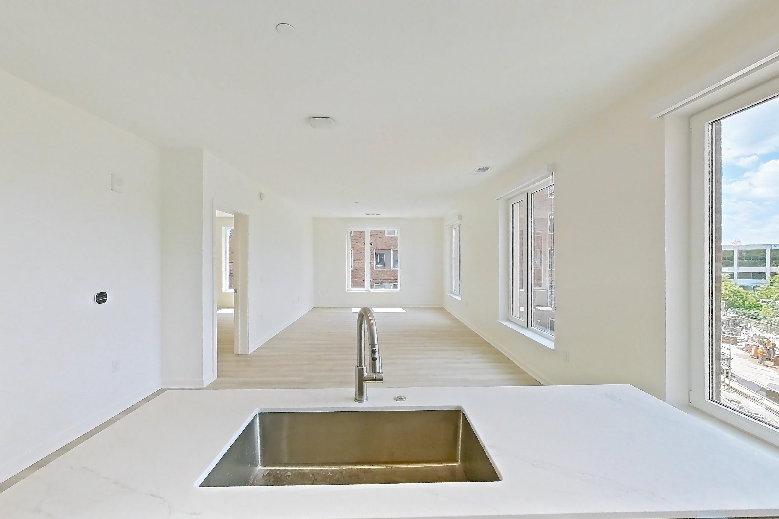 Kitchen in Apartment 303 at Residences at Mazza, 3 Bed/2 Bath/Den-M5 floor plan