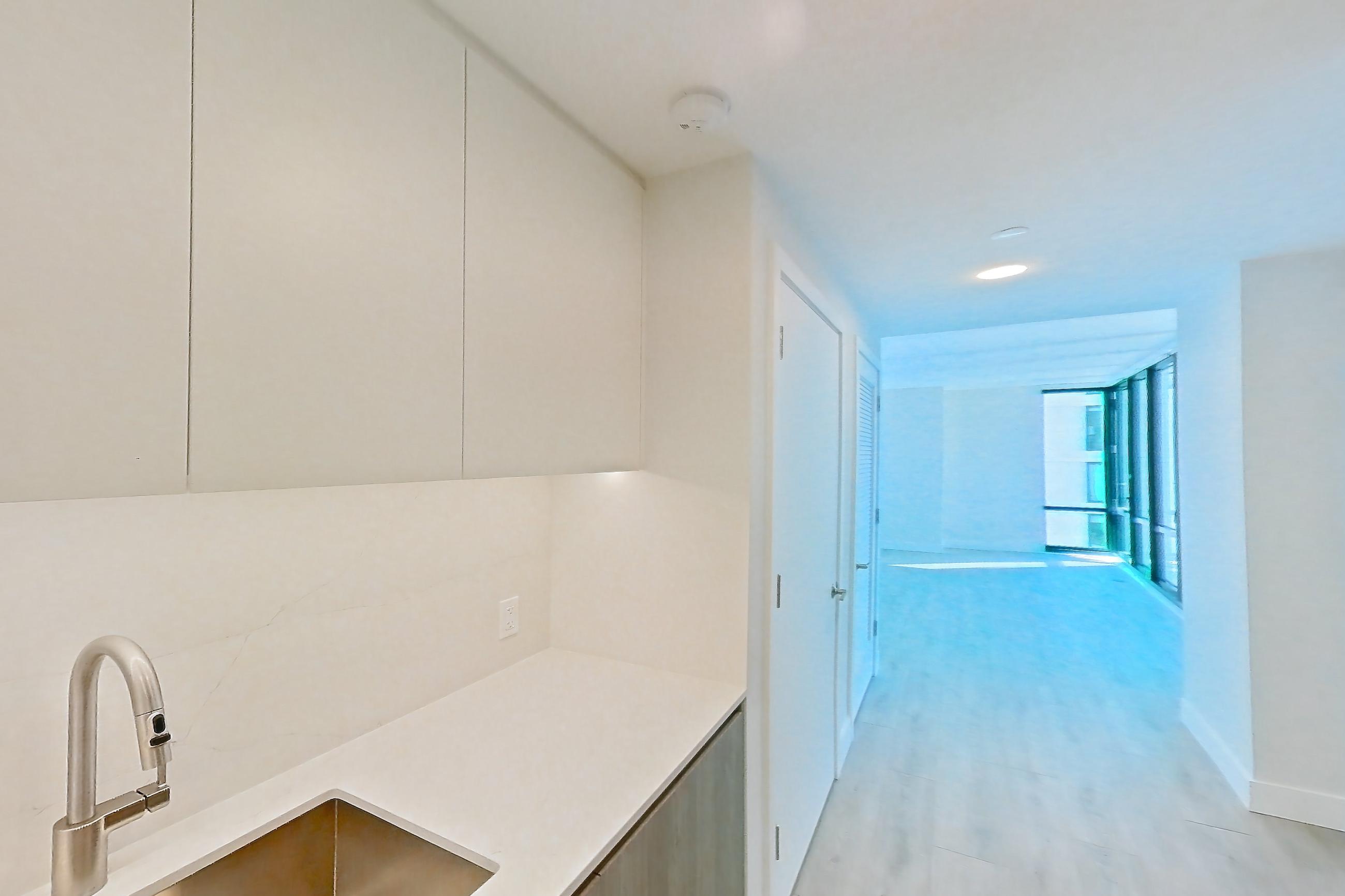 Kitchen with gas range, light wood-finish flooring, oven/range, and stainless steel appliances, Apartment 737 at Loden