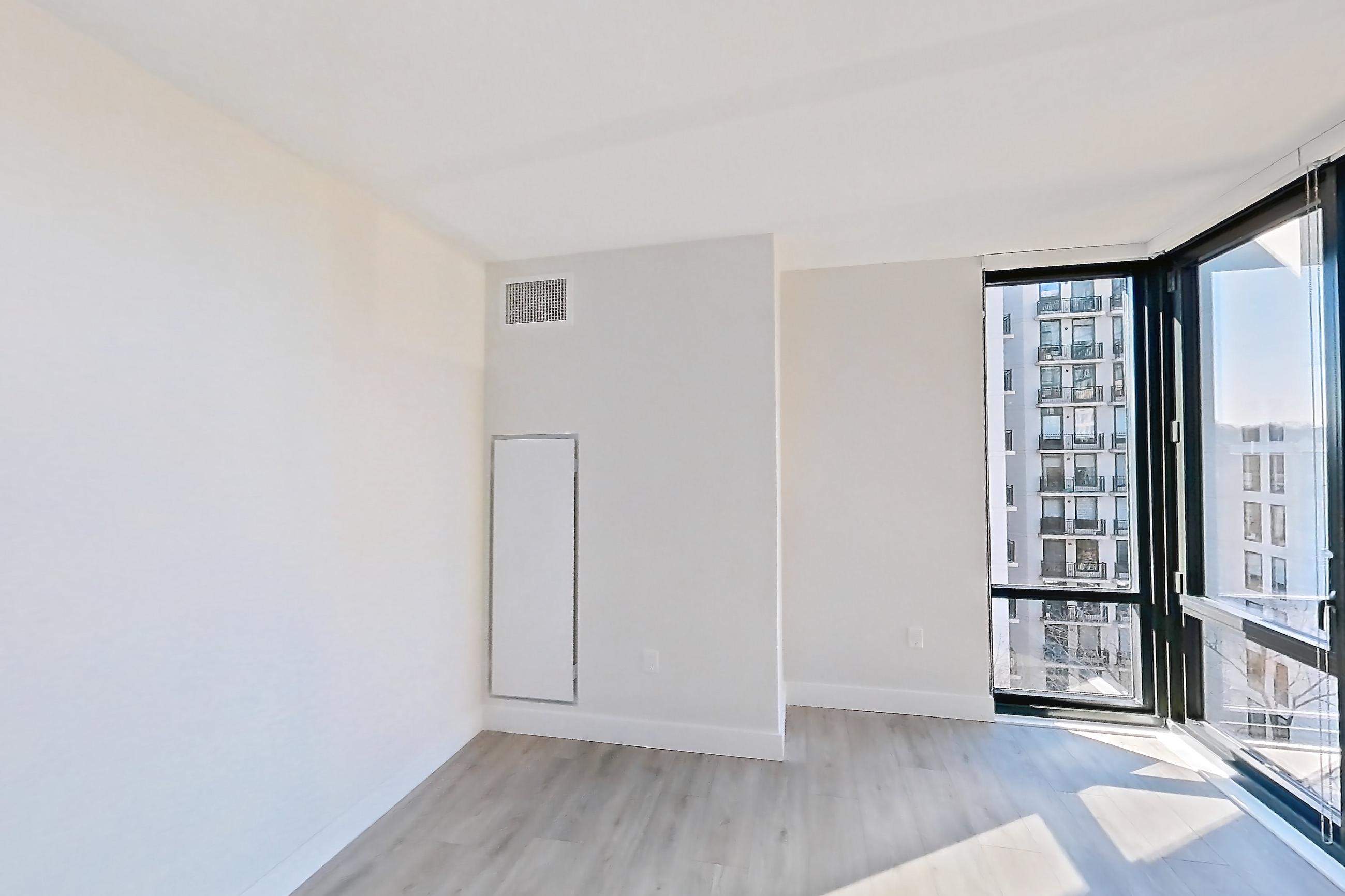 Living room with light wood-finish flooring, Apartment 737 at Loden