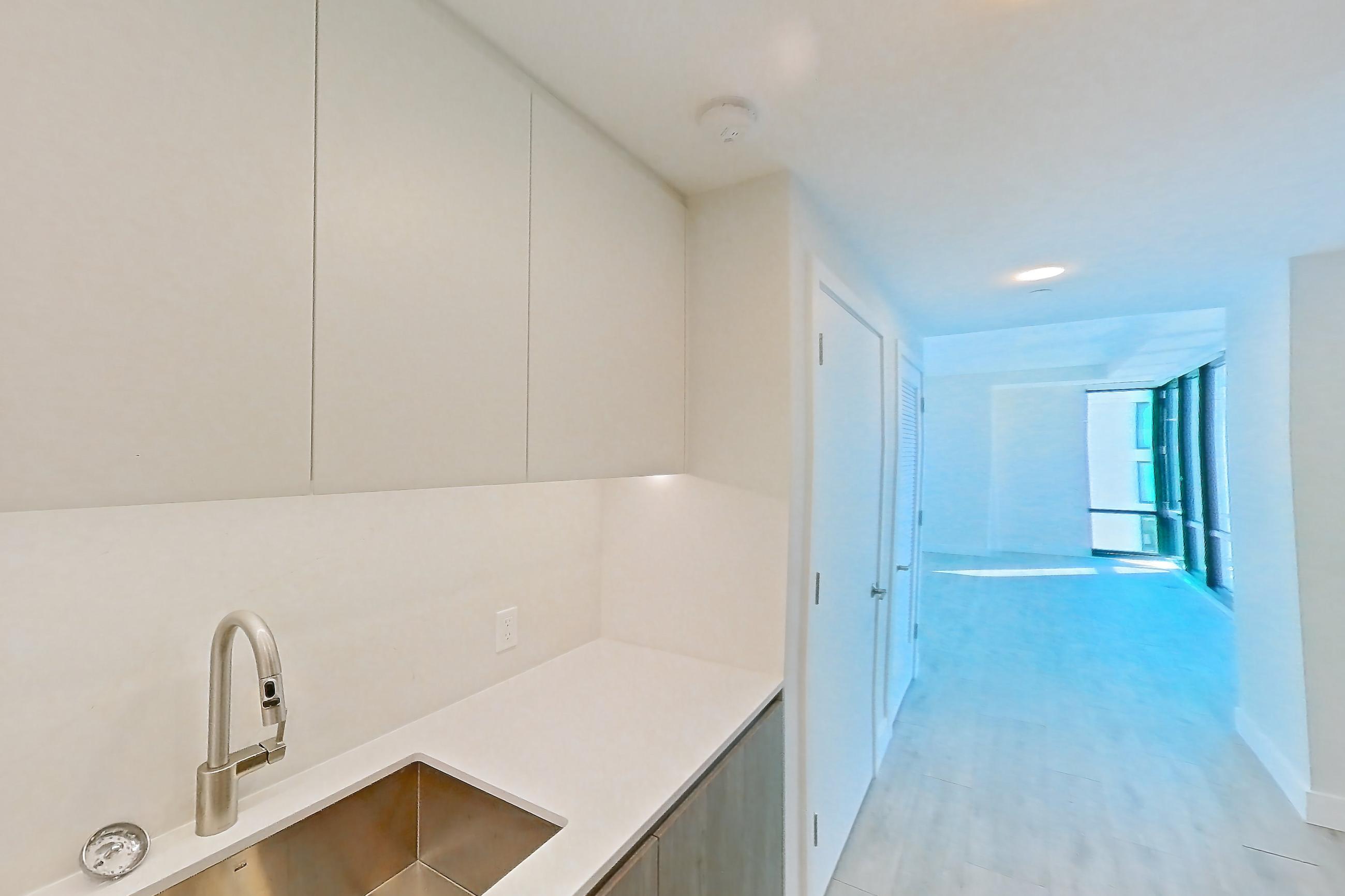 Kitchen with gas range, light wood-finish flooring, oven/range, and stainless steel appliances, Apartment 0937 at Loden