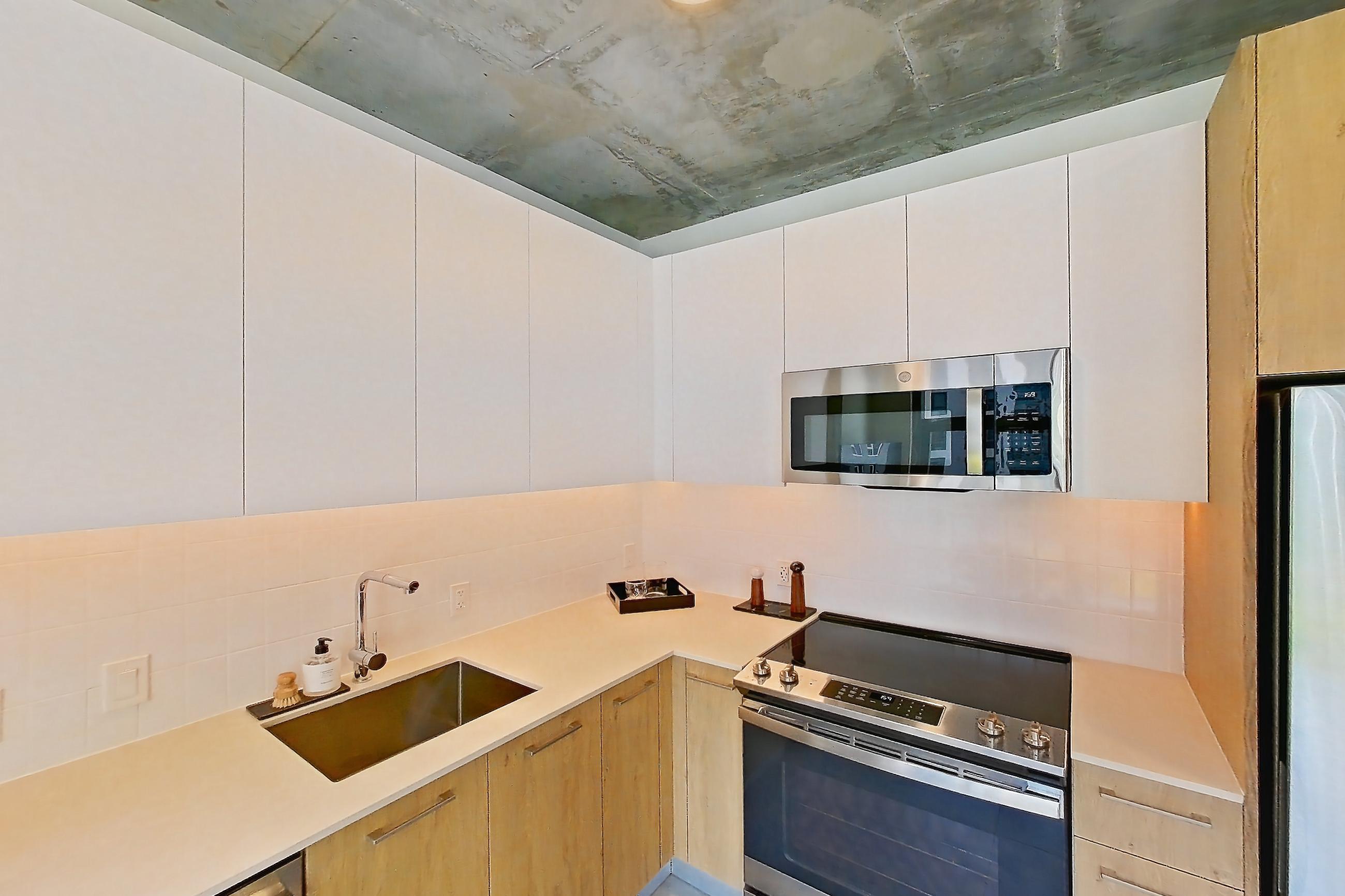 KITCHEN AND LIVING SPACE (representative of this floor plan)