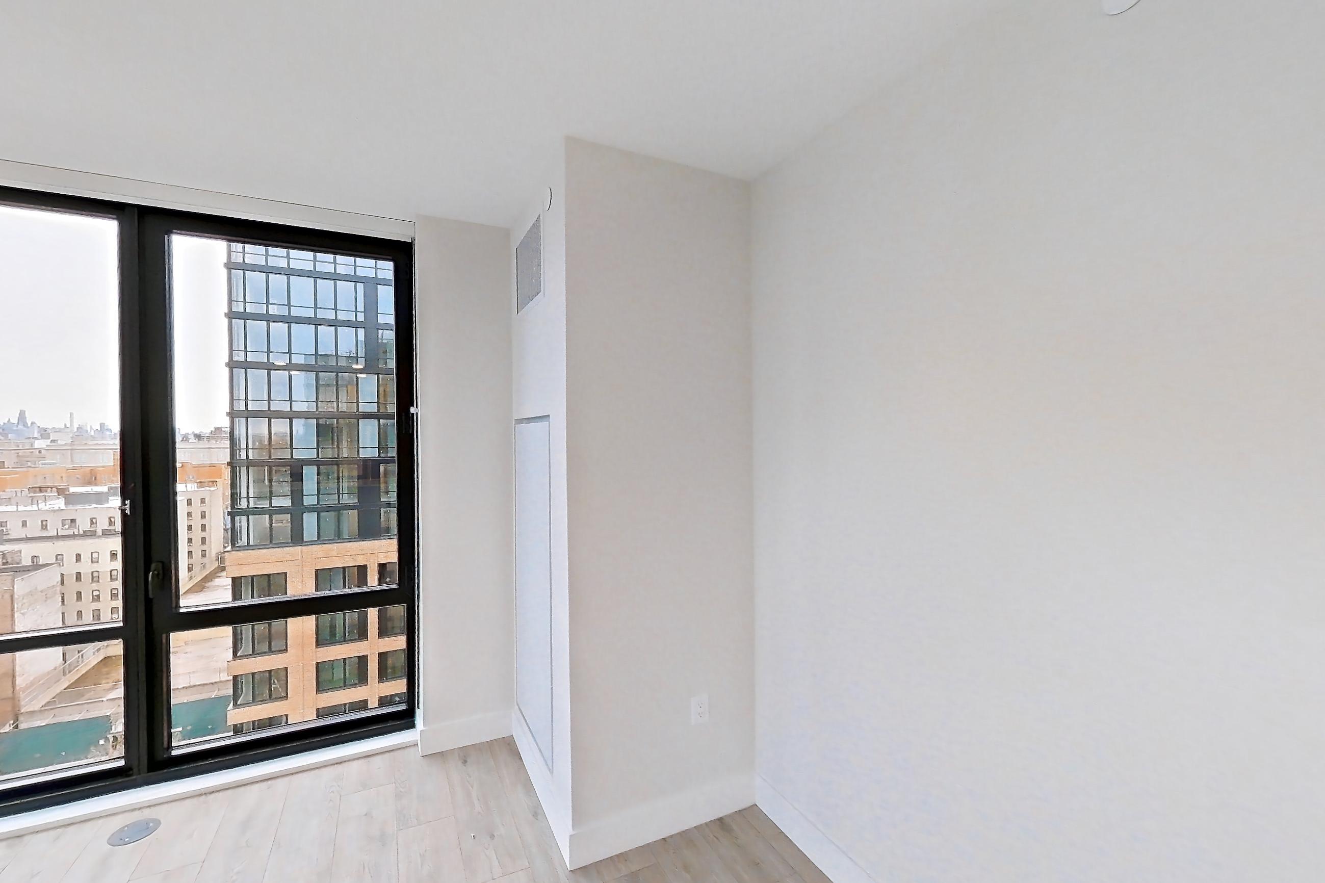 Living room with light wood-finish flooring, Apartment 1338 at Loden