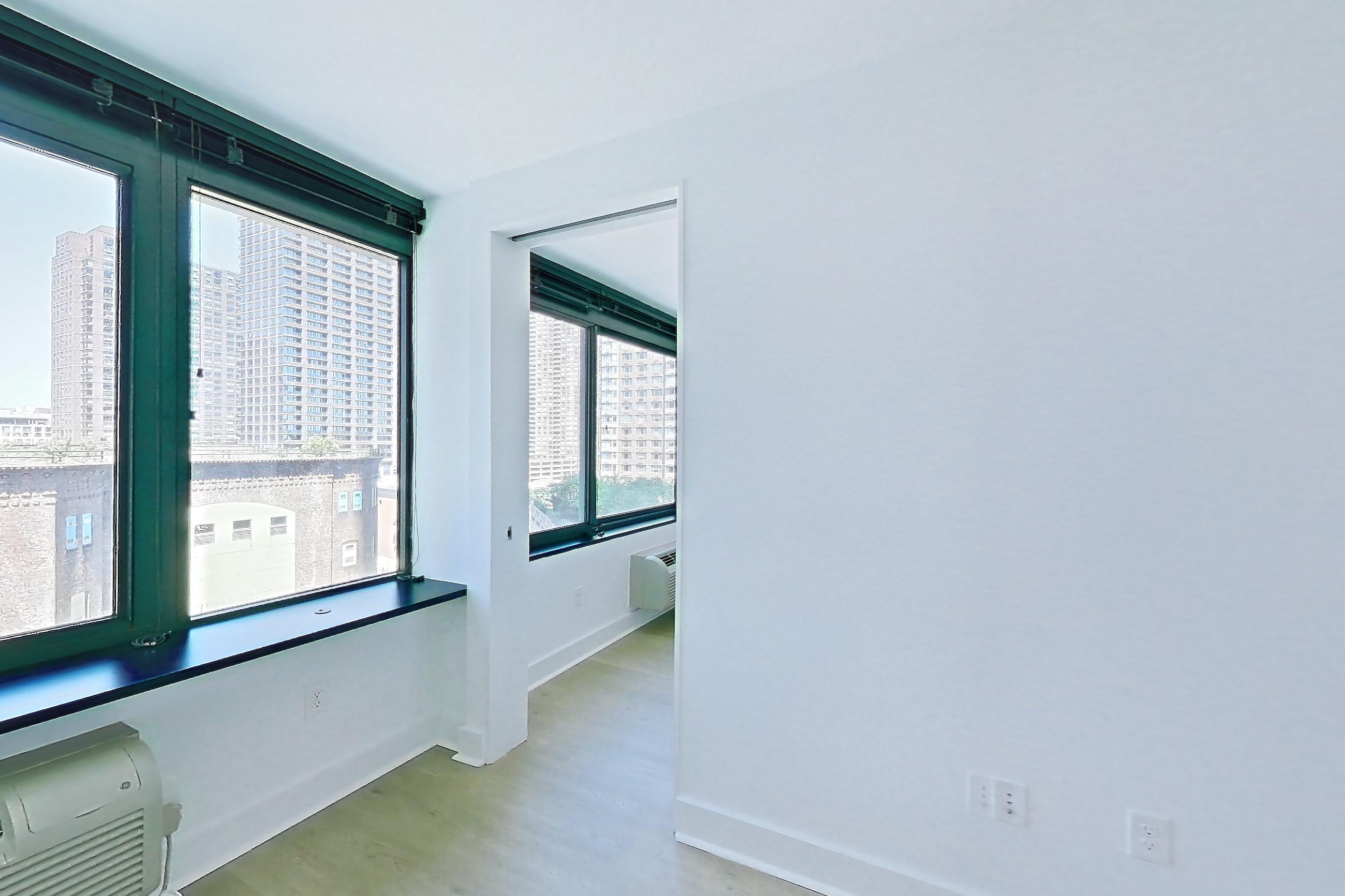 Living room with air conditioning, city view, and skyline view, Apartment SAB-1007 at Sable