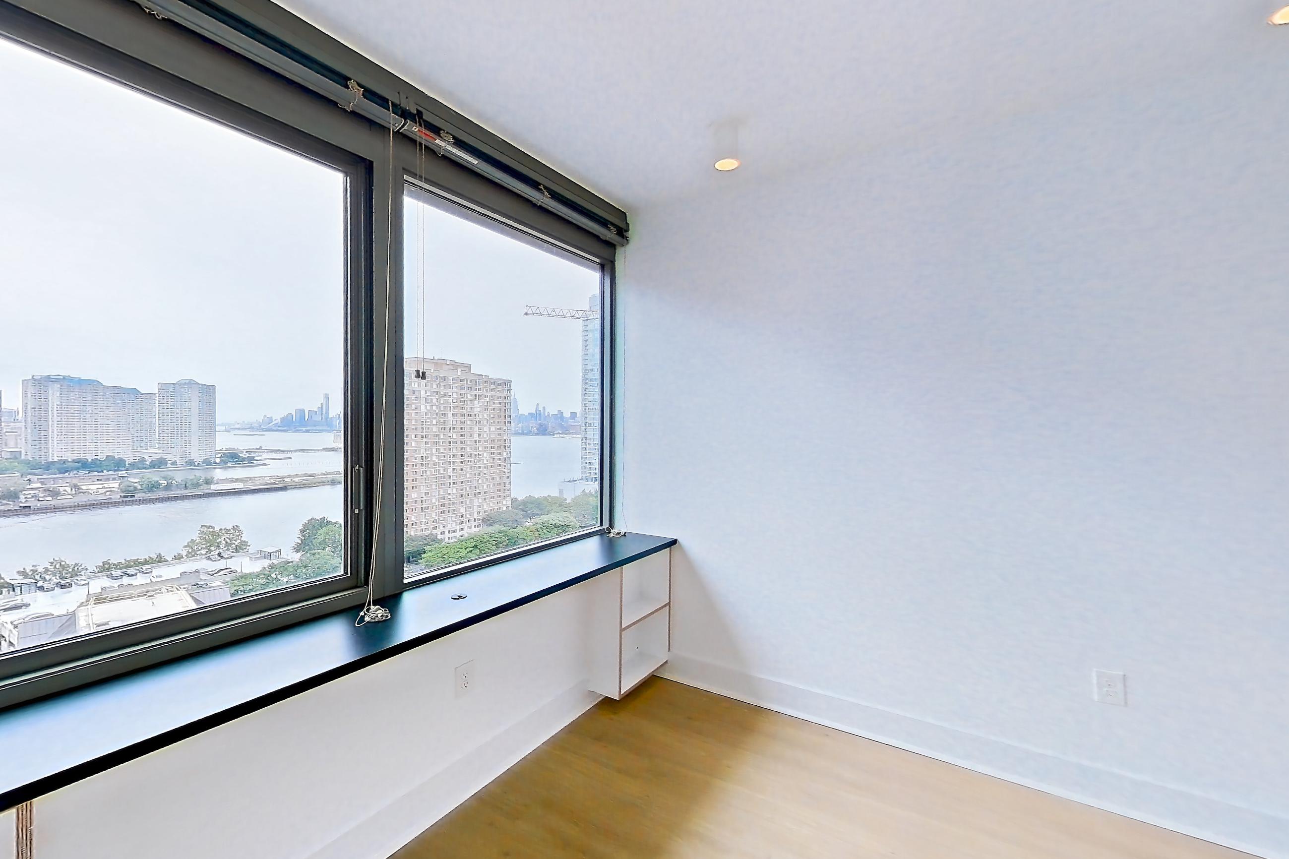 Living space with air conditioning and light wood-finish flooring, Apartment SAB-1704 at Sable